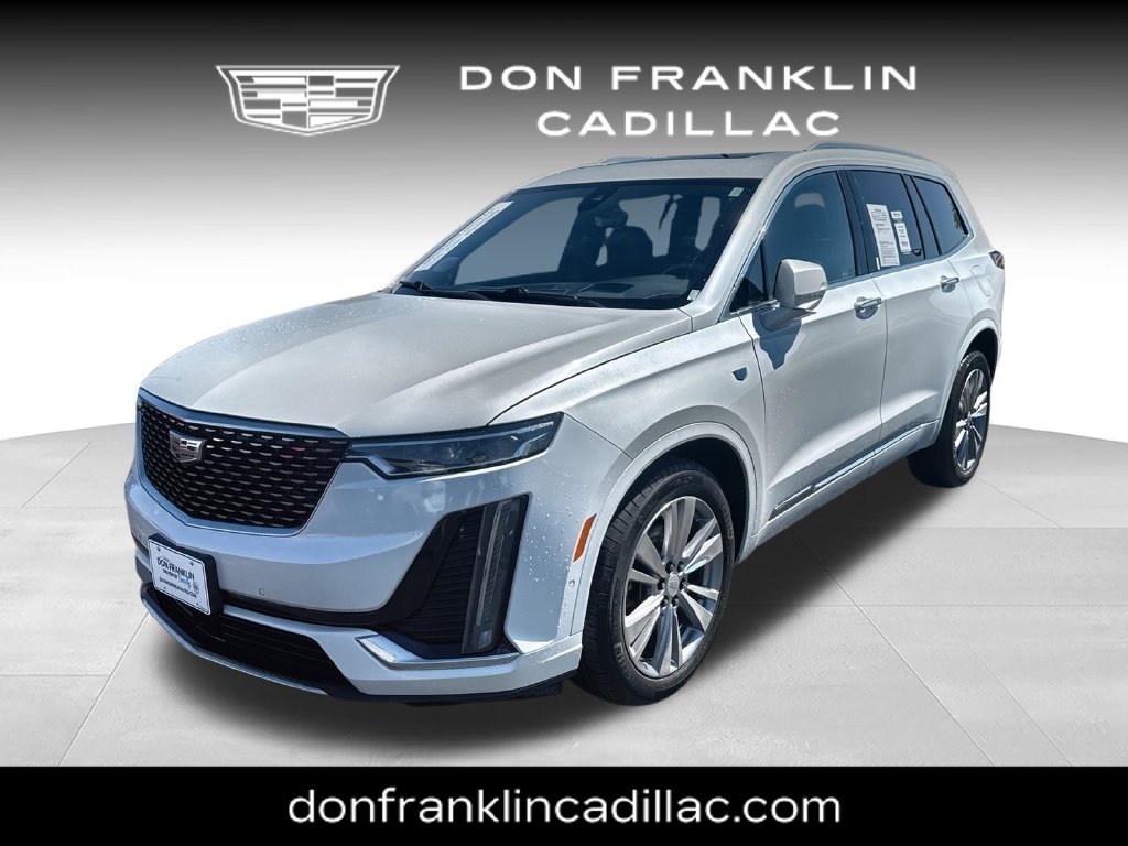 Used 2024 White Cadillac Premium Luxury image 1