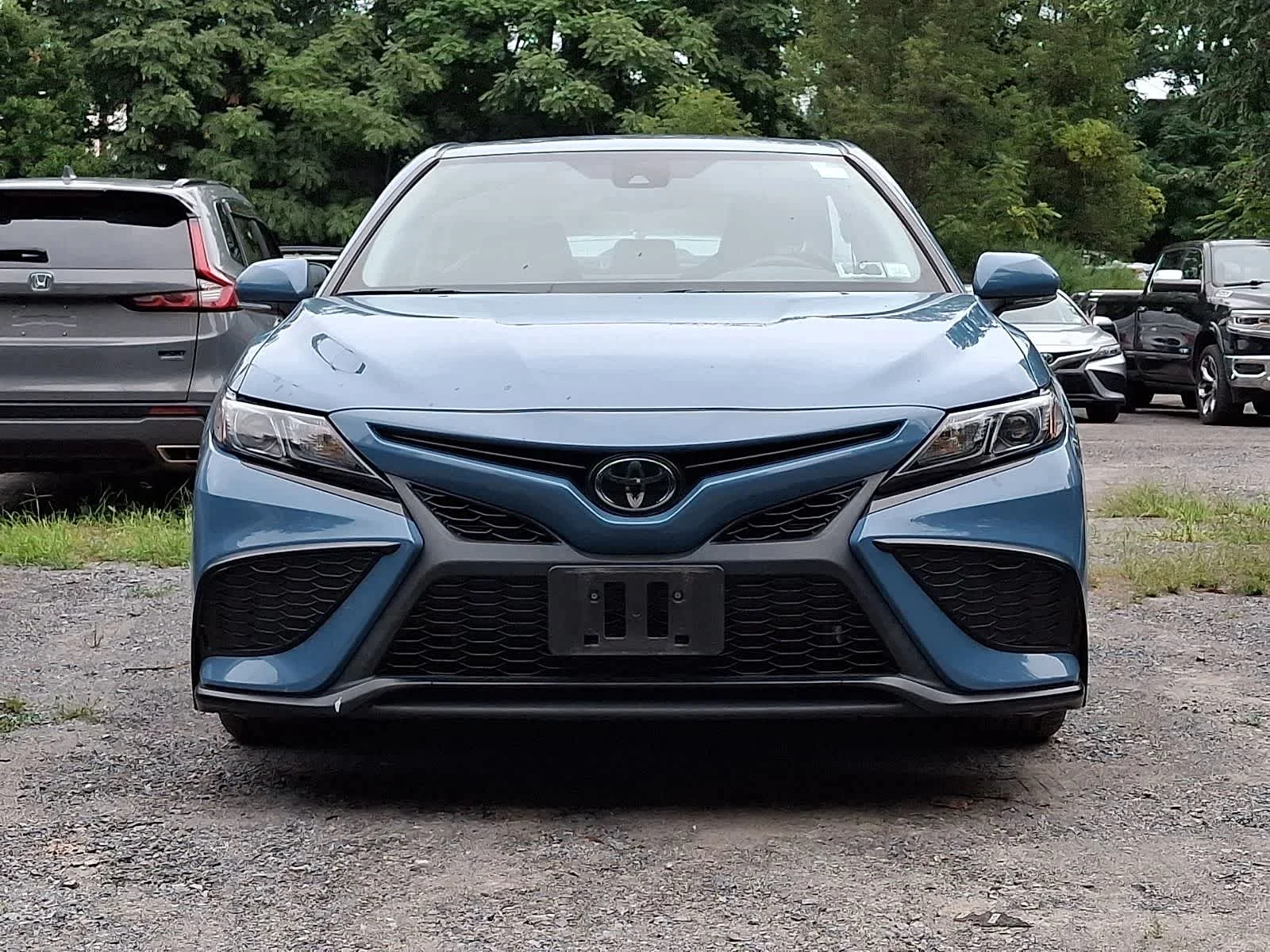 Used 2024 Cavalry Blue Toyota SE image 3