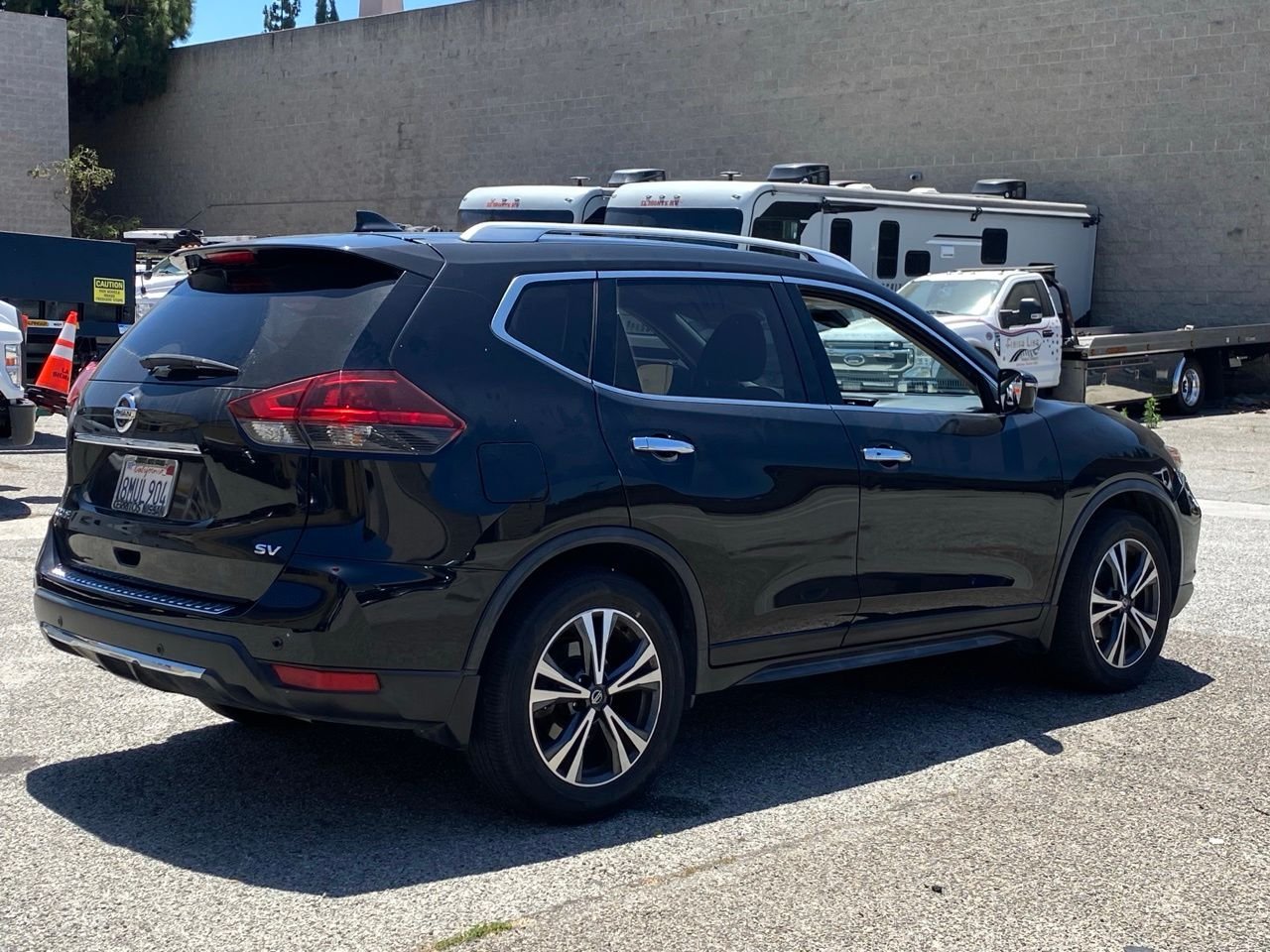Used 2019 Magnetic Black Pearl Nissan SV image 3