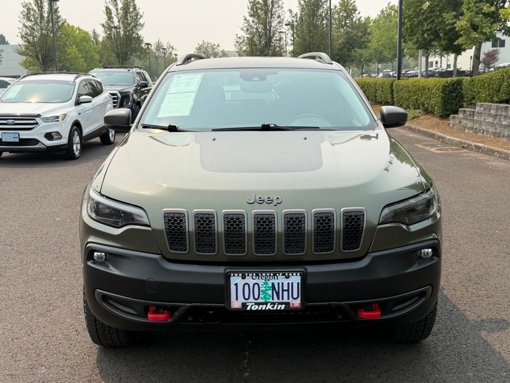 Used 2021 Olive Green Pearlcoat Jeep Trailhawk image 3