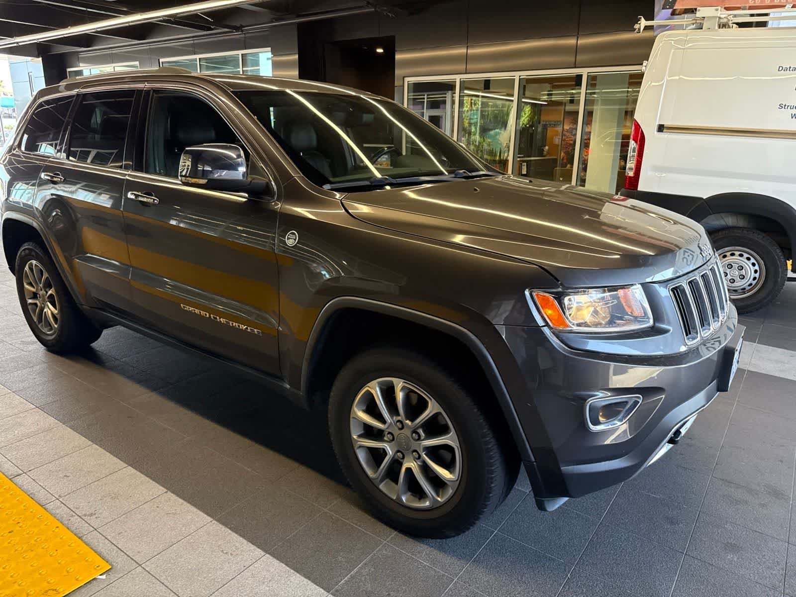 Used 2016 Granite Crystal Metallic Clearcoat Jeep Limited image 7