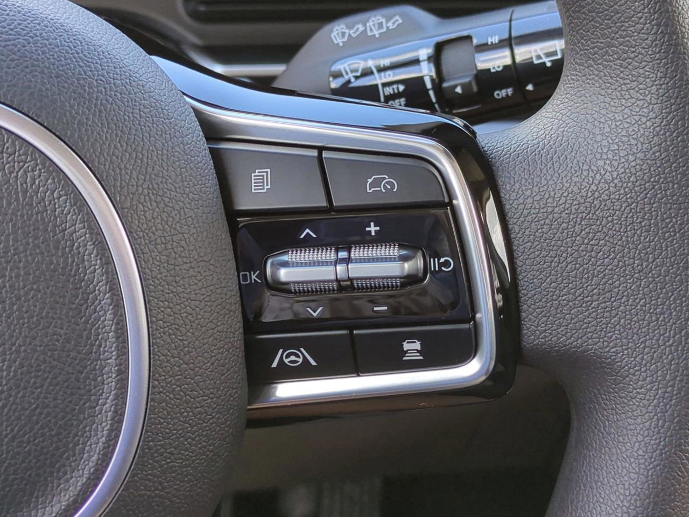 New 2026 Deep Chroma Blue Kia LX image 28