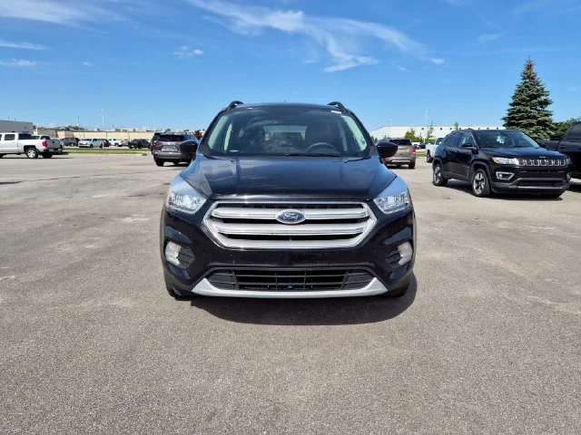 Used 2018 Ford Escape SE with VIN 1FMCU9GD1JUB40238 for sale in Saginaw, MI