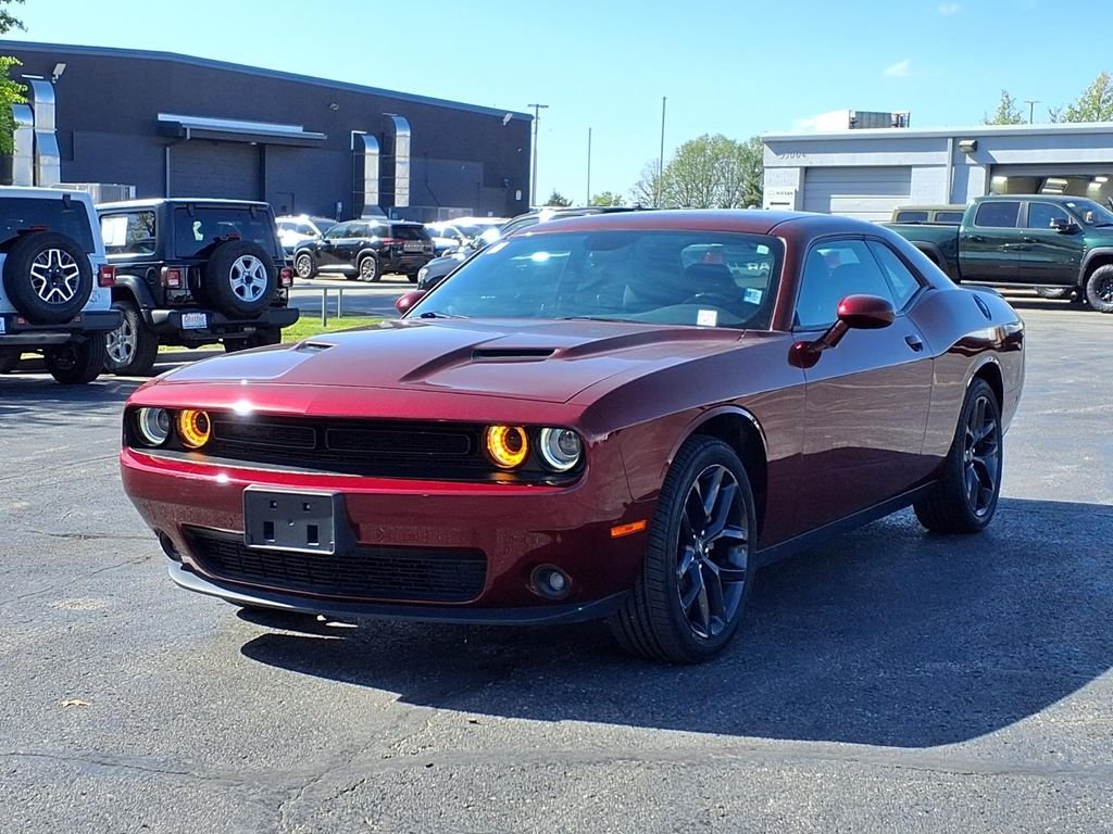 Used 2021 Dodge Challenger SXT with VIN 2C3CDZAG0MH604929 for sale in Kansas City