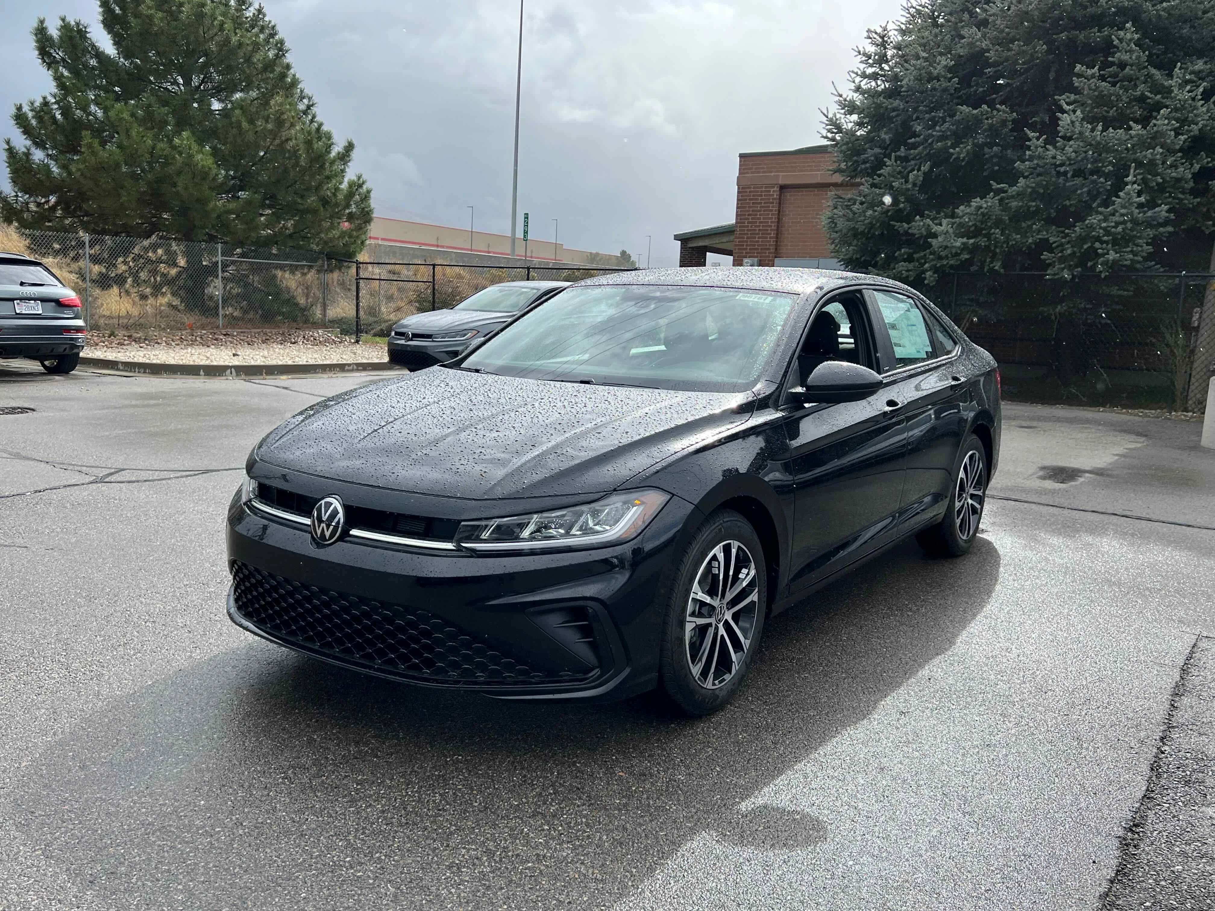 New 2026 Black Volkswagen Sport image 8