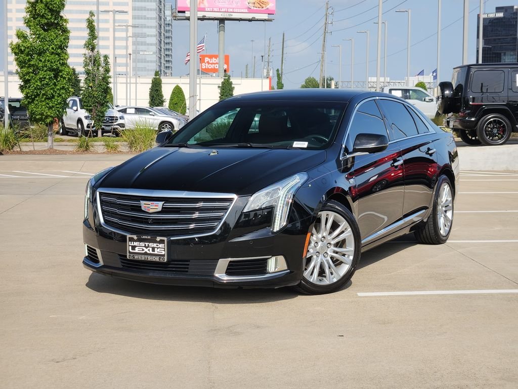 Used 2018 Black Raven Cadillac Luxury image 1