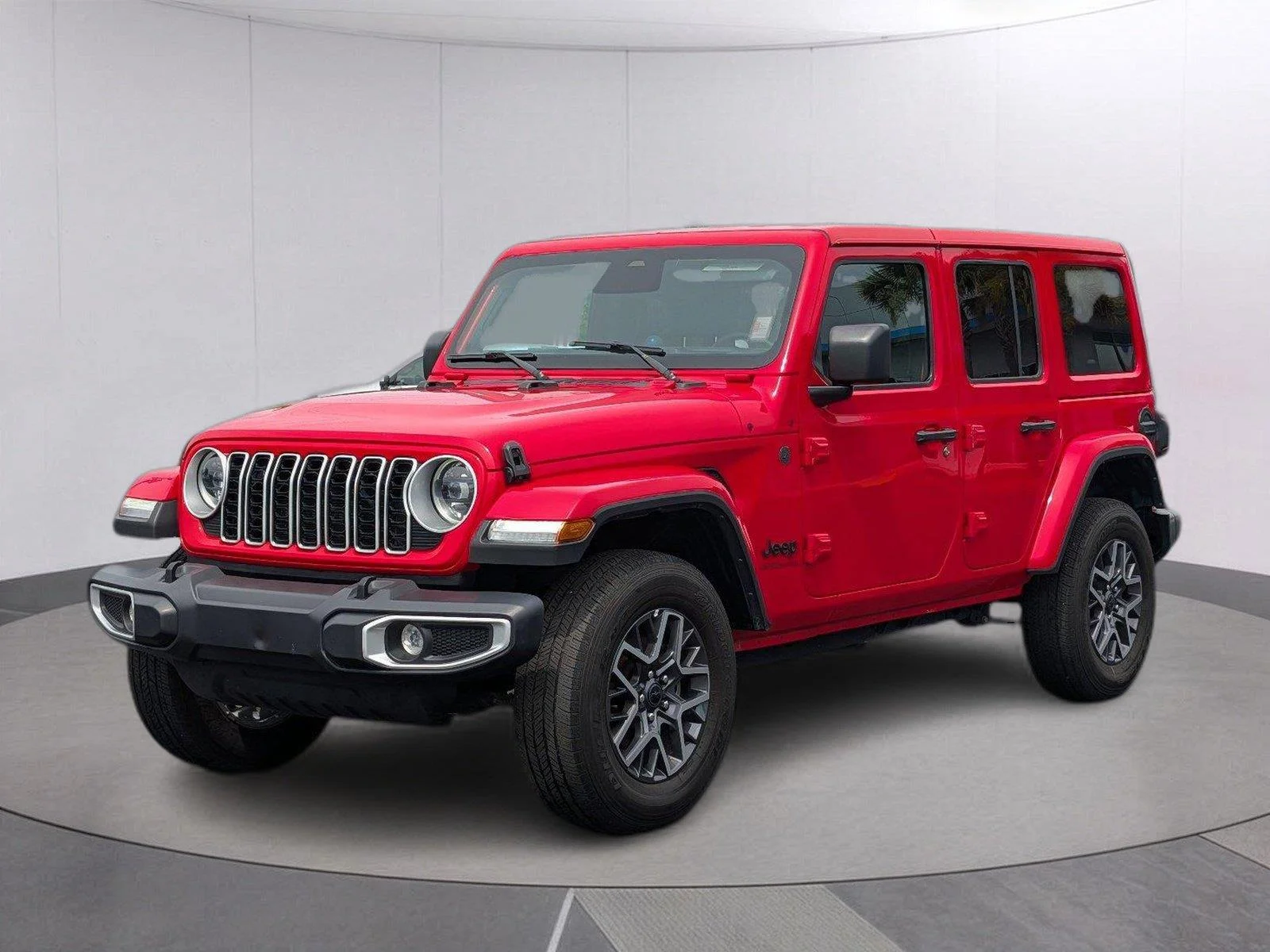 Used 2025 Firecracker Red Clearcoat Jeep Sahara image 1