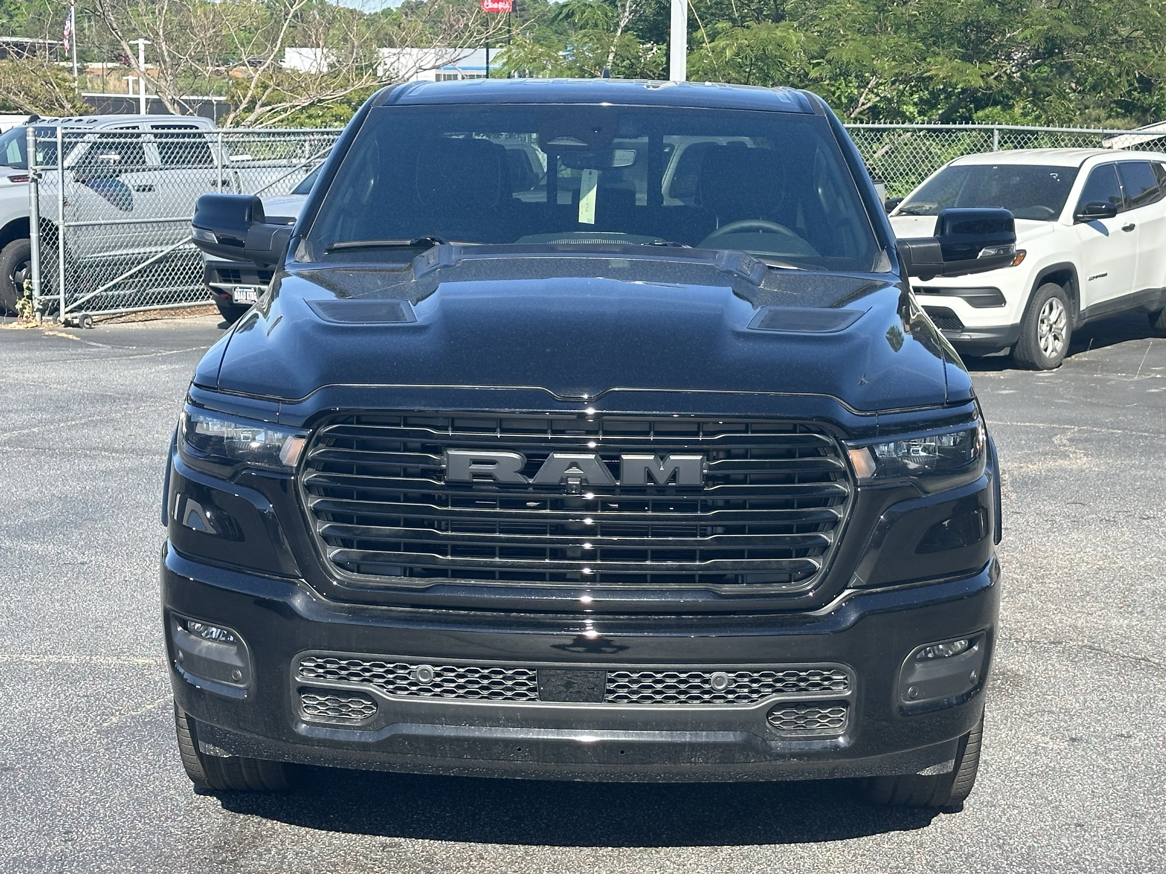 New 2026 Diamond Black Crystal Pearl-Coat Exterior Paint RAM Laramie image 3