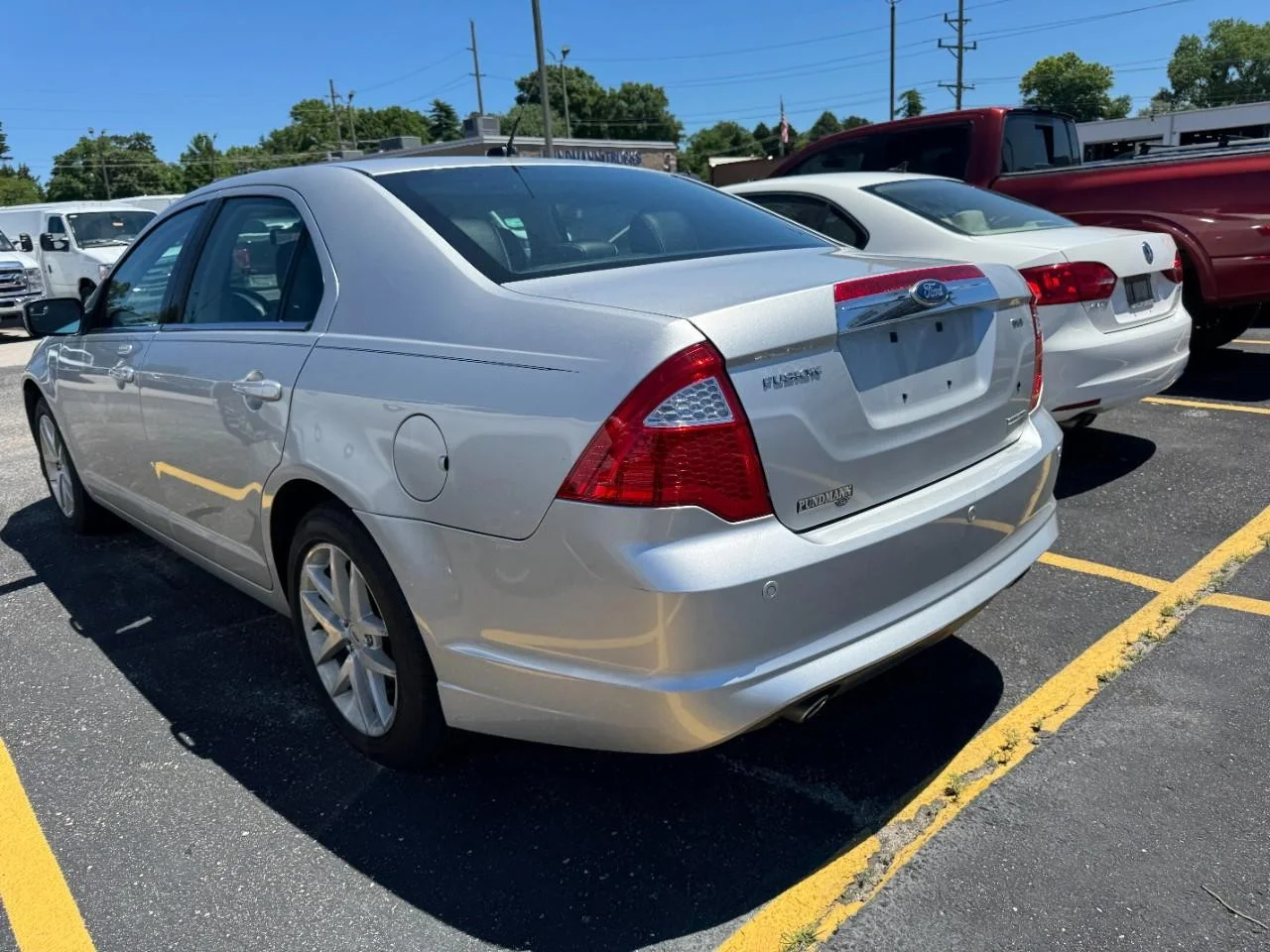 Used 2012 Ingot Silver Metallic Ford 4dr Sdn SEL FWD image 9