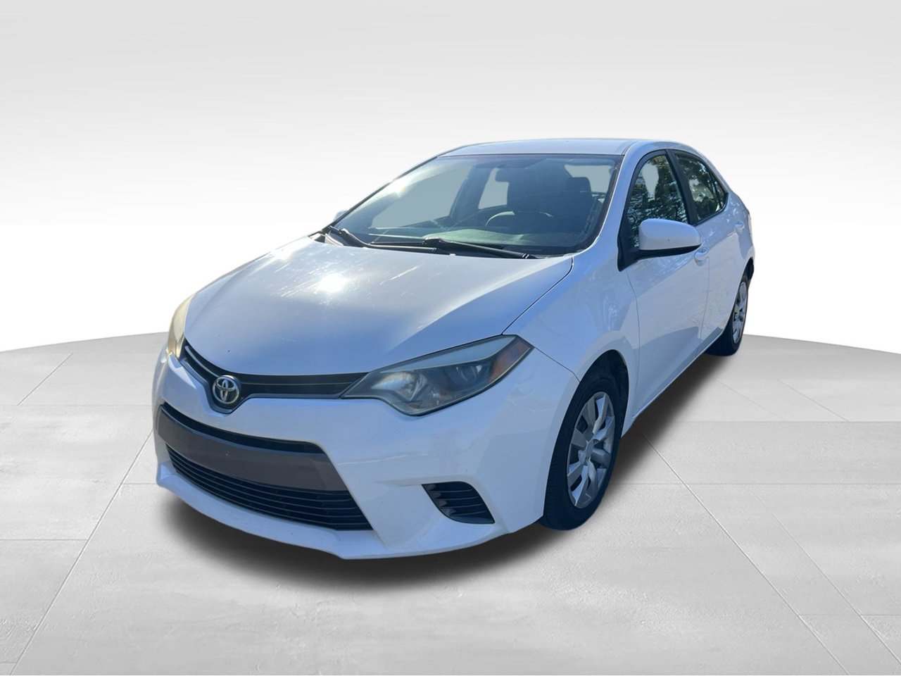 Used 2016 White Toyota LE image 1