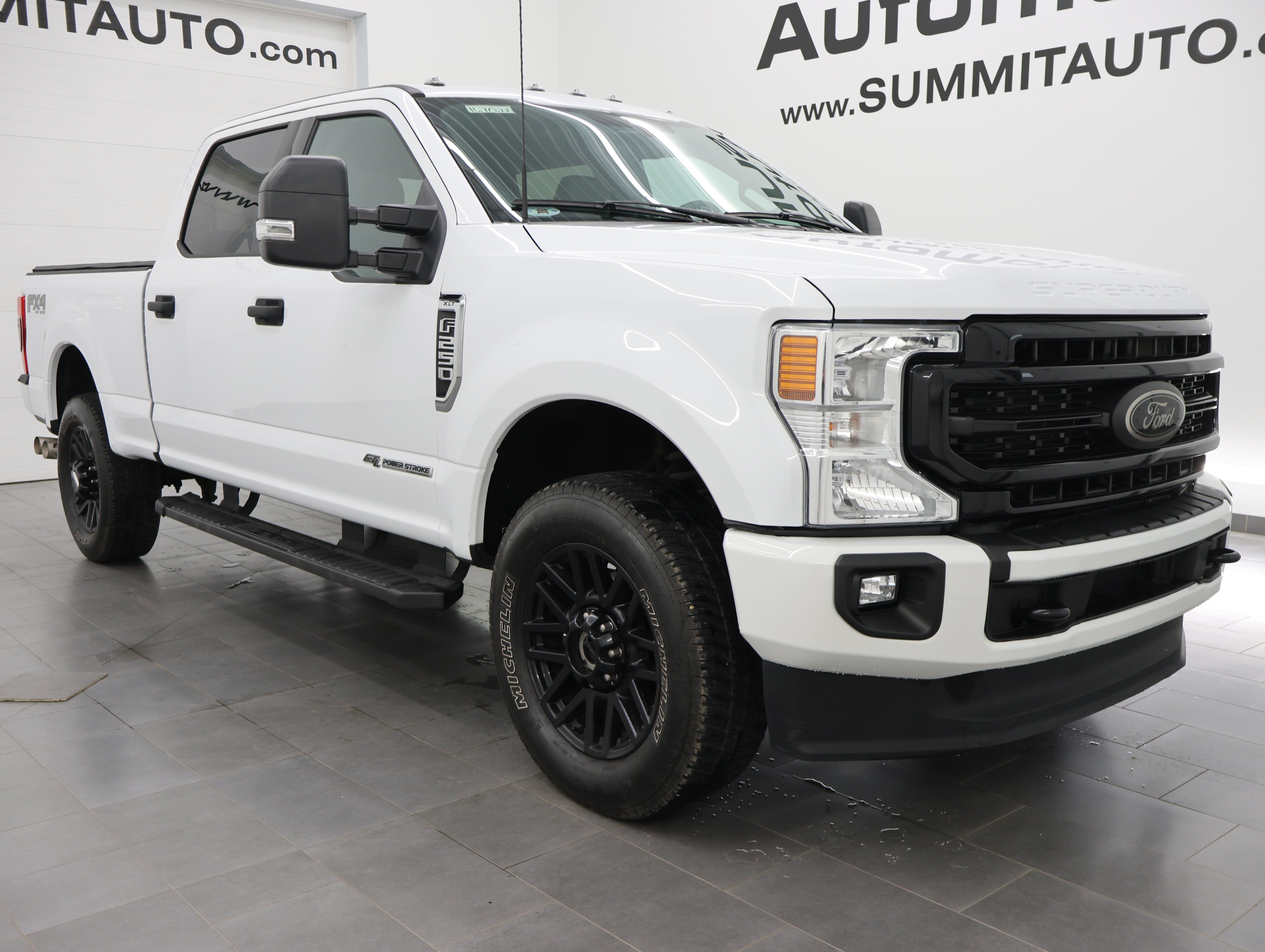 Used 2022 Oxford White Ford 4x4 Crew Cab XLT w/FX4: CREW-SHORT-XLT-6.7L DIESEL-FX4-NAVIGATION-4WD-1 OWNER image 2