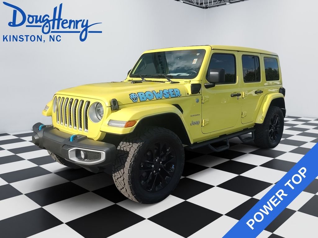 Used 2022 Yellow Jeep Unlimited Sahara 4xe image 1