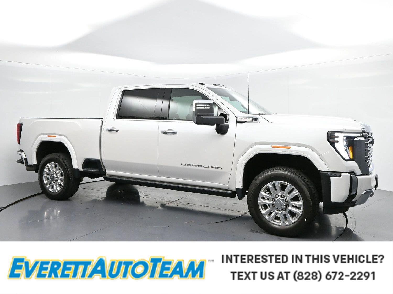 Used 2025 White Frost Tricoat GMC Denali image 1