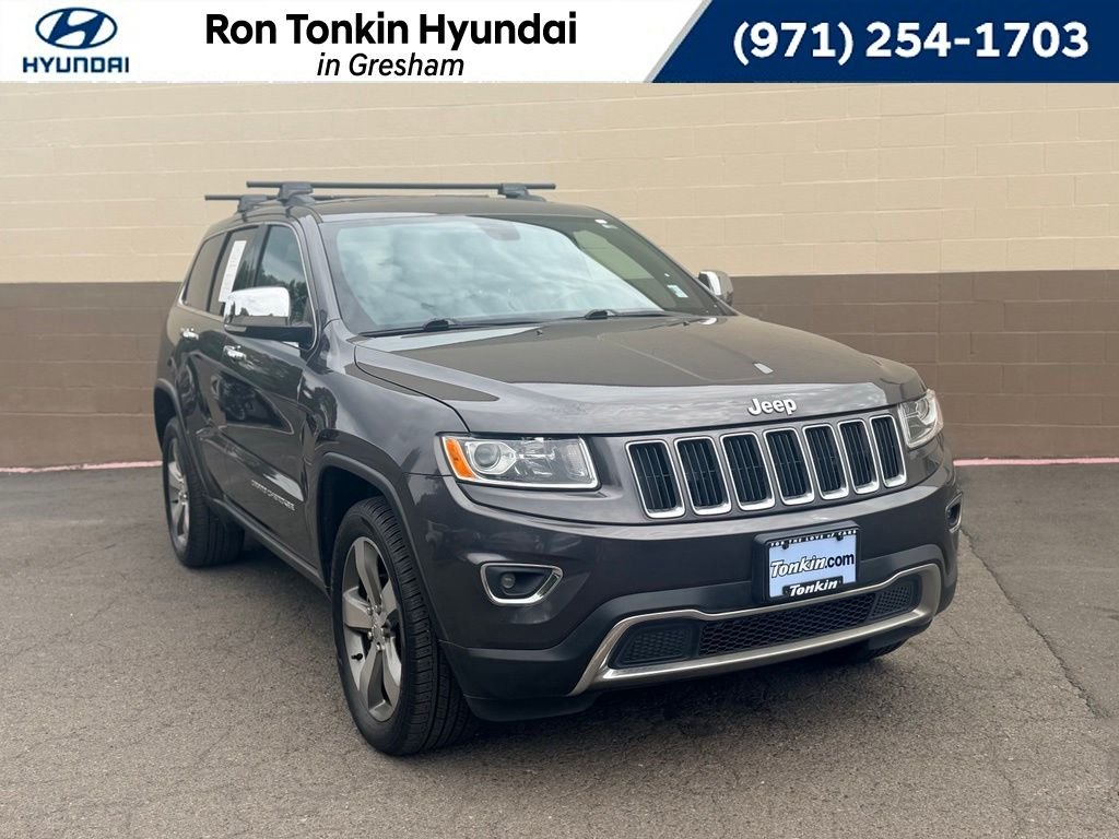 Used 2015 Gray Jeep Limited image 1