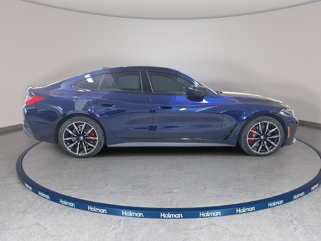 Used 2023 Tanzanite Blue II Metallic BMW eDrive40 image 6