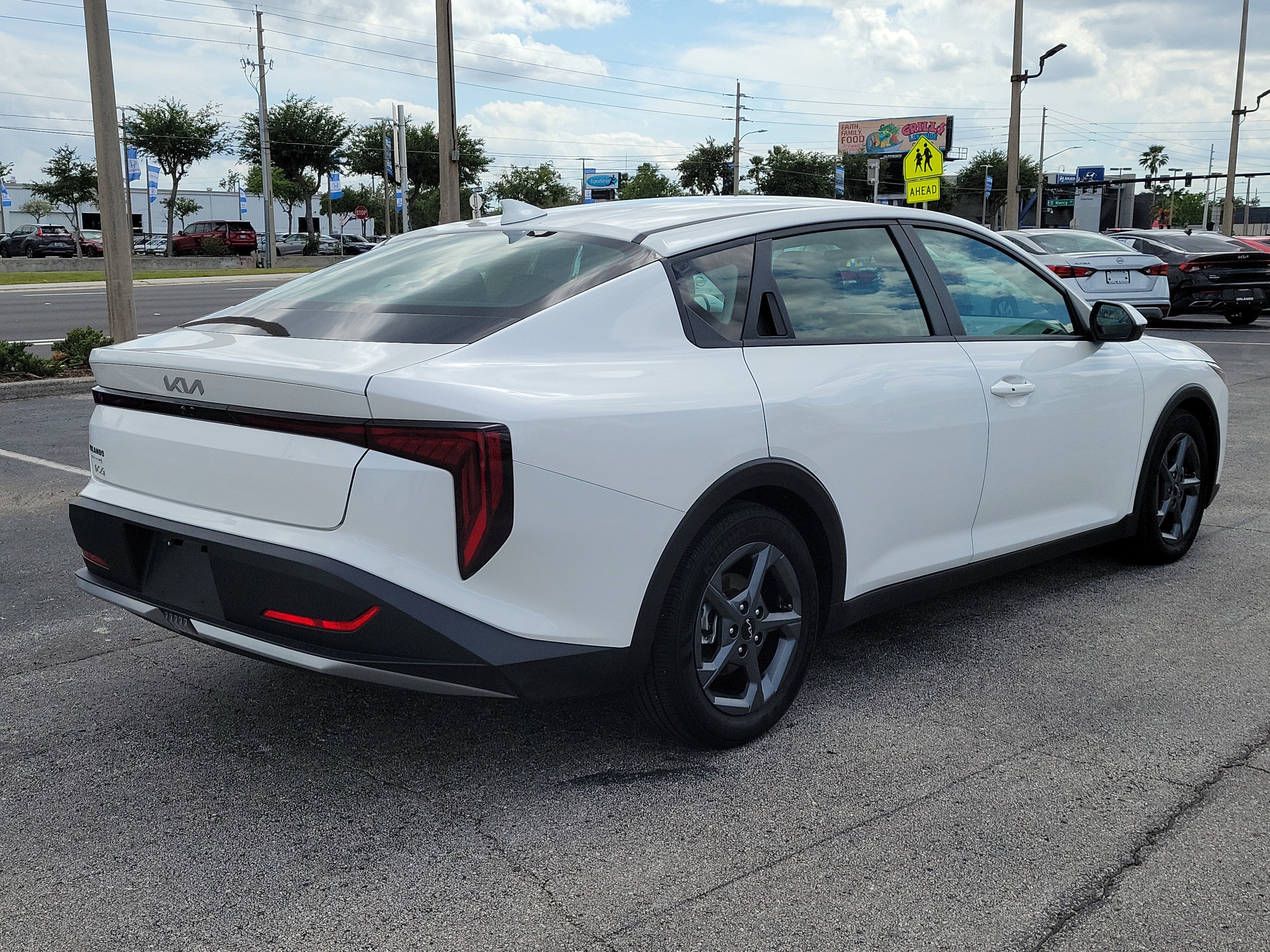 Used 2025 Snow White Pearl Kia LXS image 6