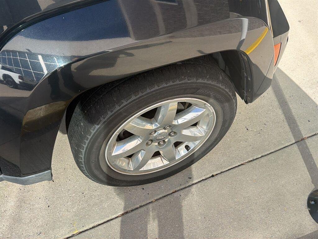 Used 2012 Brilliant Black Crystal Pearl Jeep Sport Latitude image 19