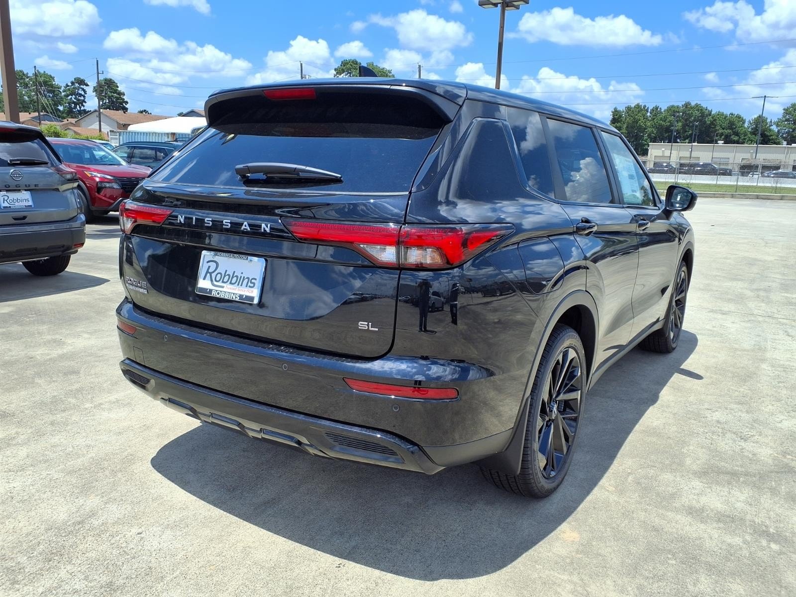 2026 Nissan Rogue Plug-In Hybrid SL Black at Sterling McCall Nissan