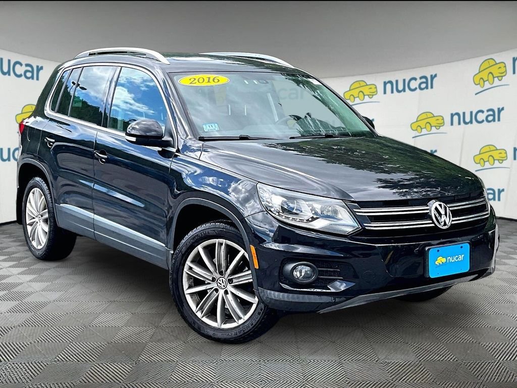 Used 2016 Deep Black Pearl Effect Volkswagen SE image 1
