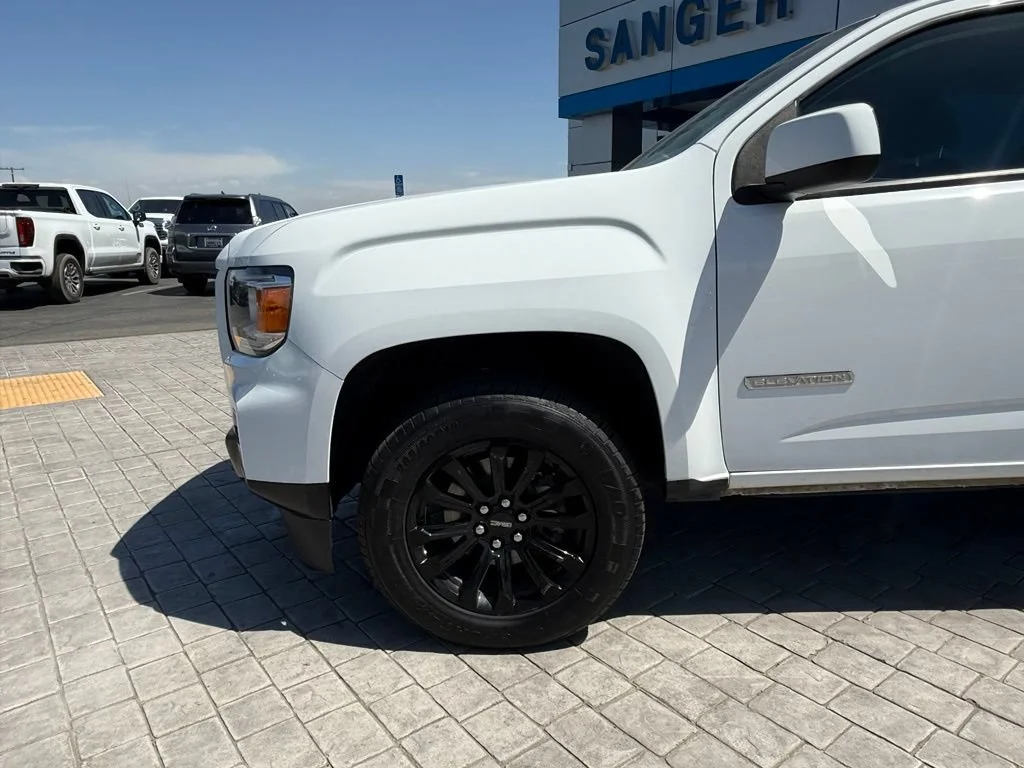 Used 2022 SUMMIT WHITE GMC 4WD Elevation image 5