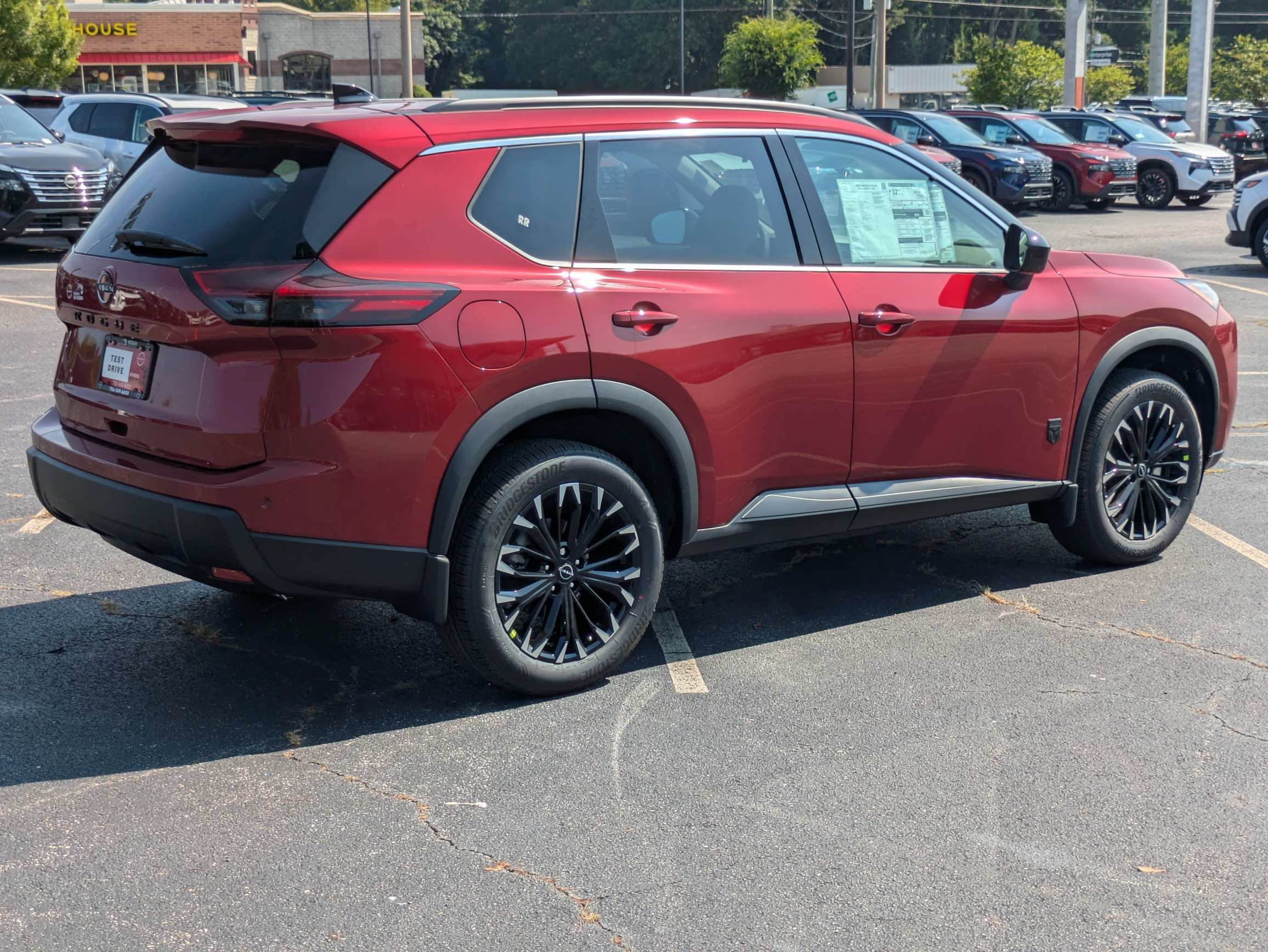 New 2026 Red Nissan Dark Armor image 2