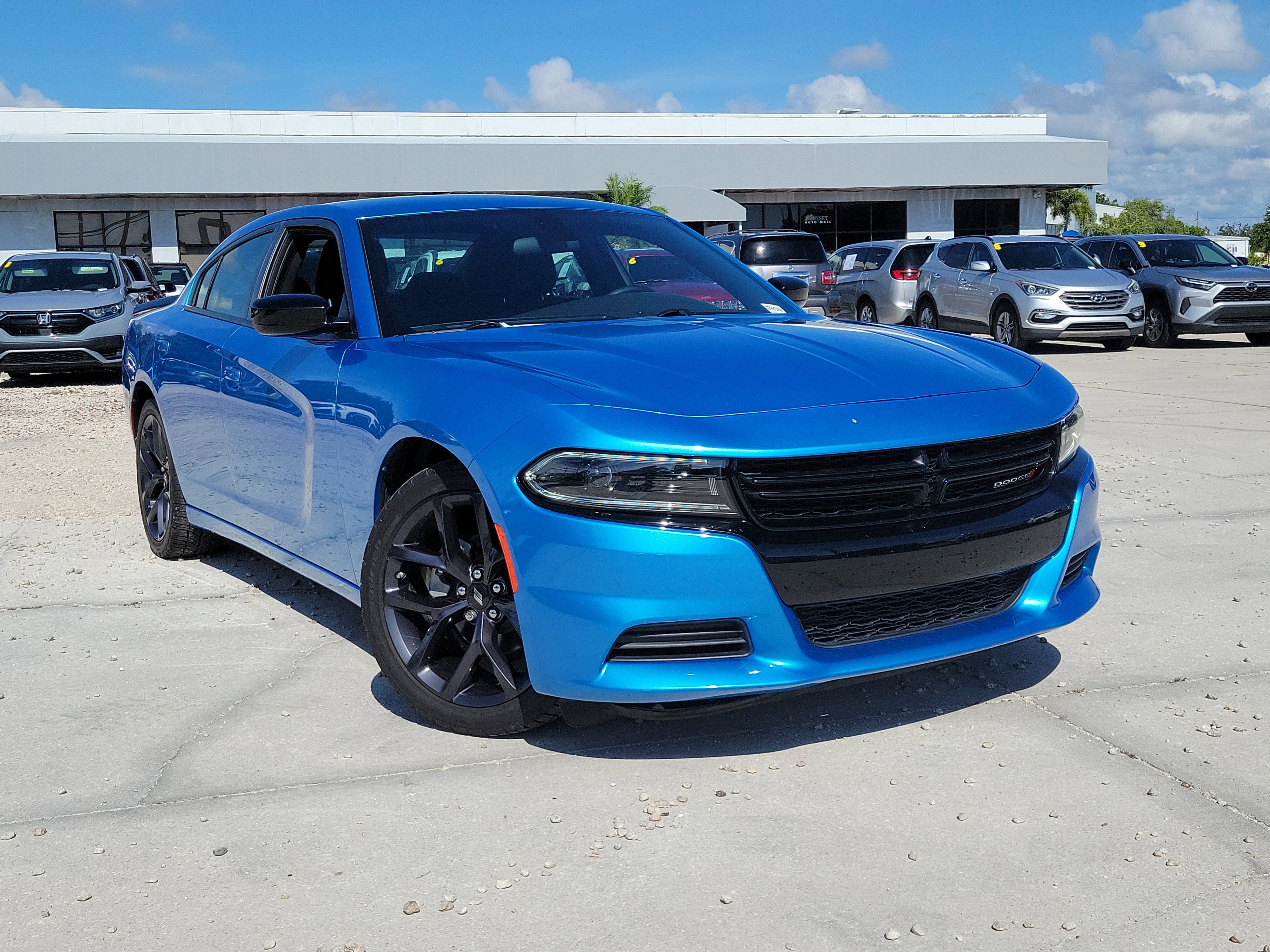 Used 2023 B5 Blue Pearlcoat Dodge SXT image 1