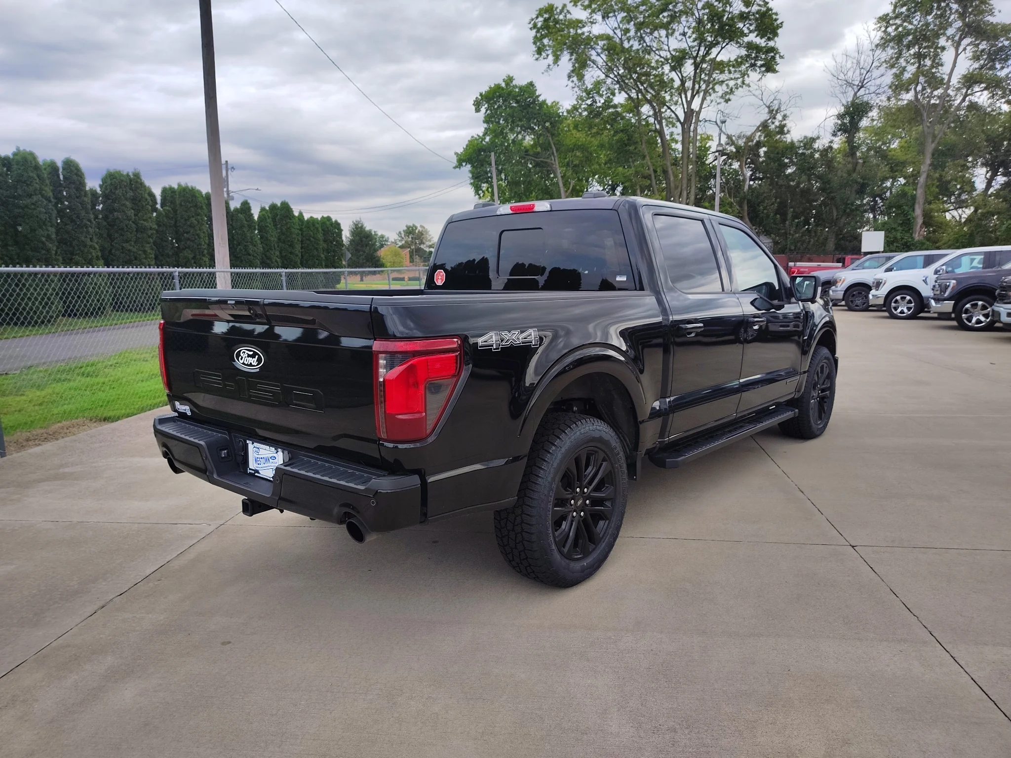 Used 2024 Agate Black Metallic Ford XLT image 4