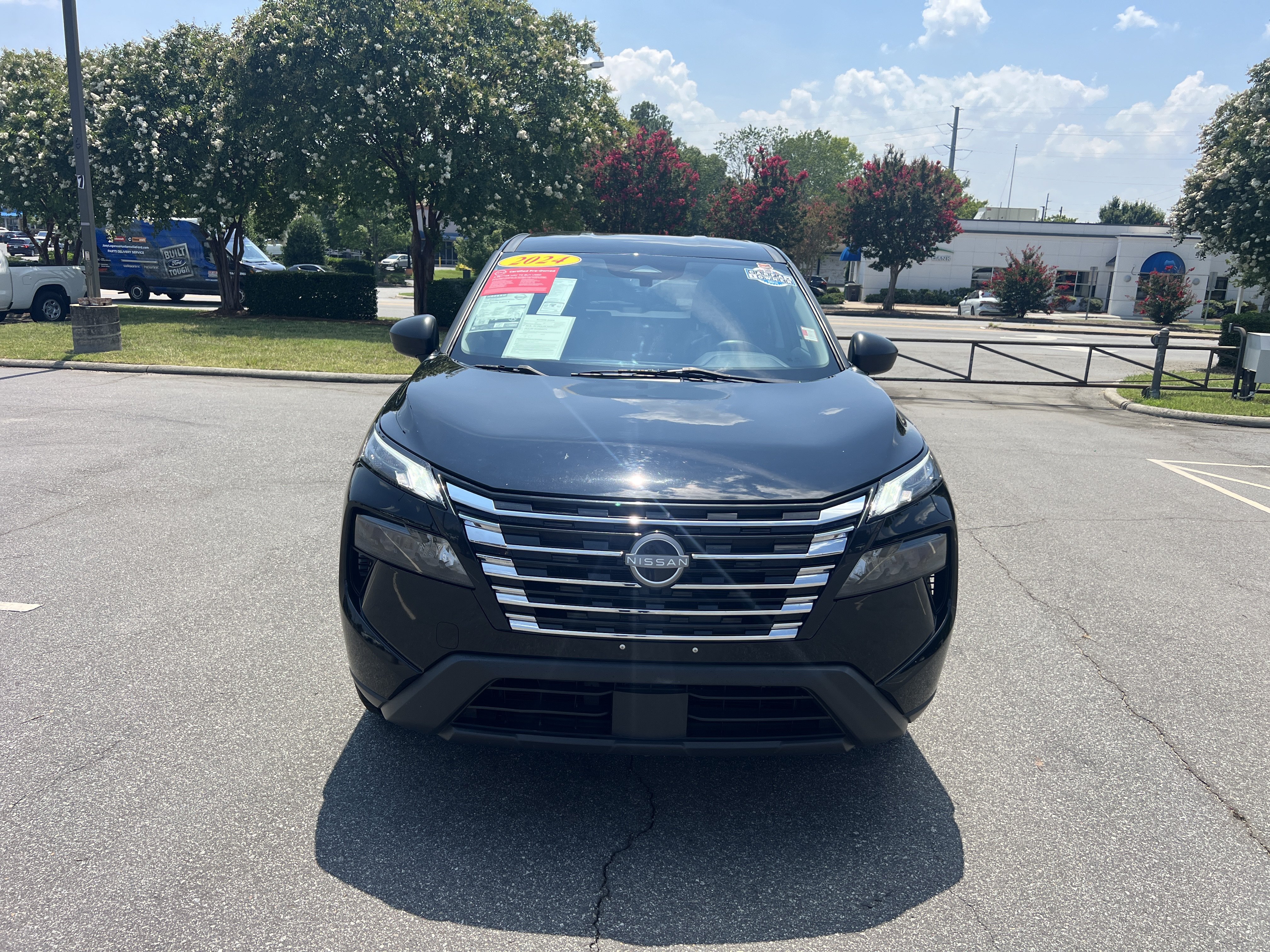 Certified Used 2024 Super Black Nissan S image 2