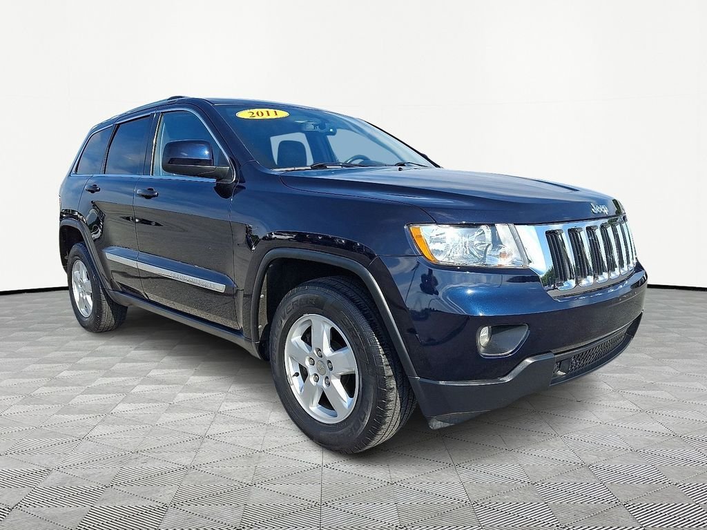 Used 2011 Black Jeep Laredo image 1