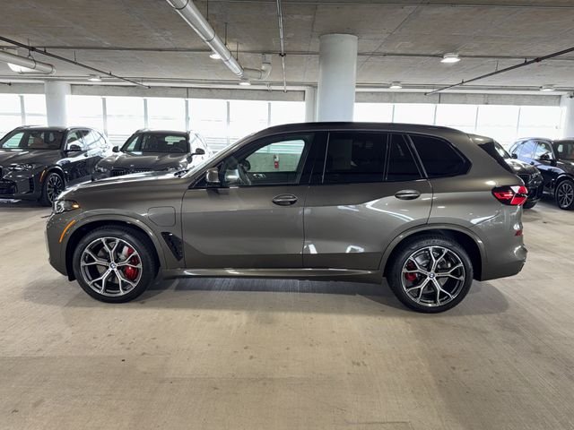 New 2026 Manhattan Green Metallic BMW xDrive50e image 4