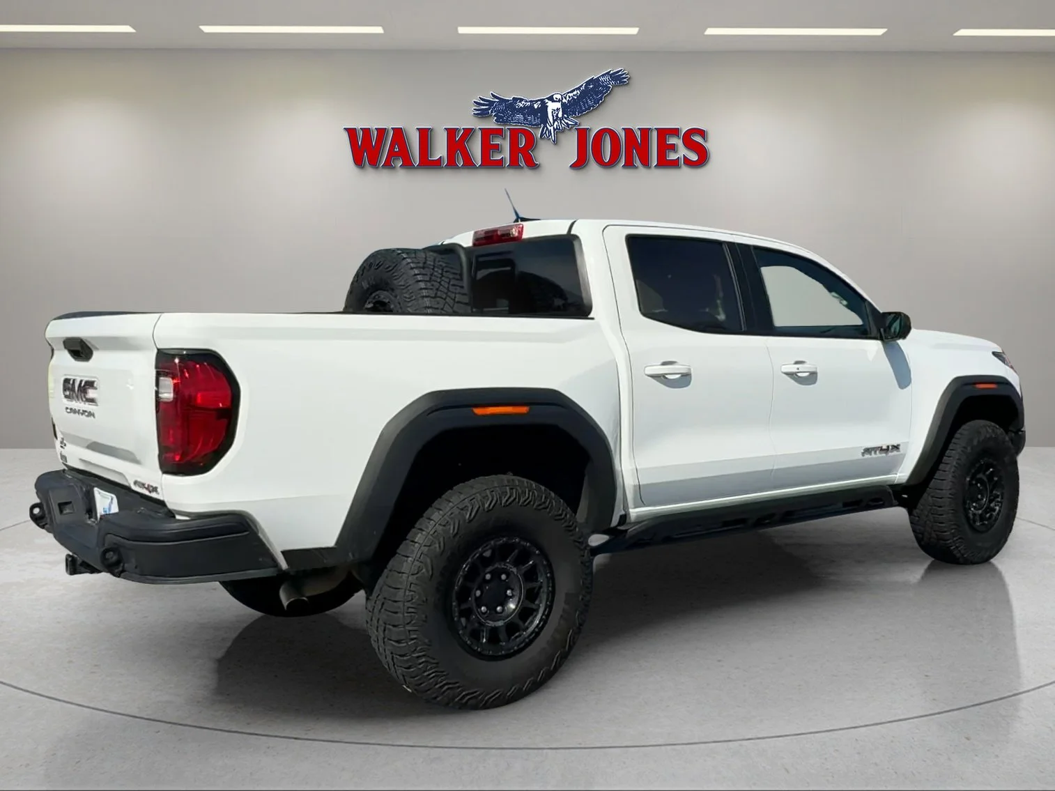 Used 2024 Summit White GMC 4WD AT4X image 4