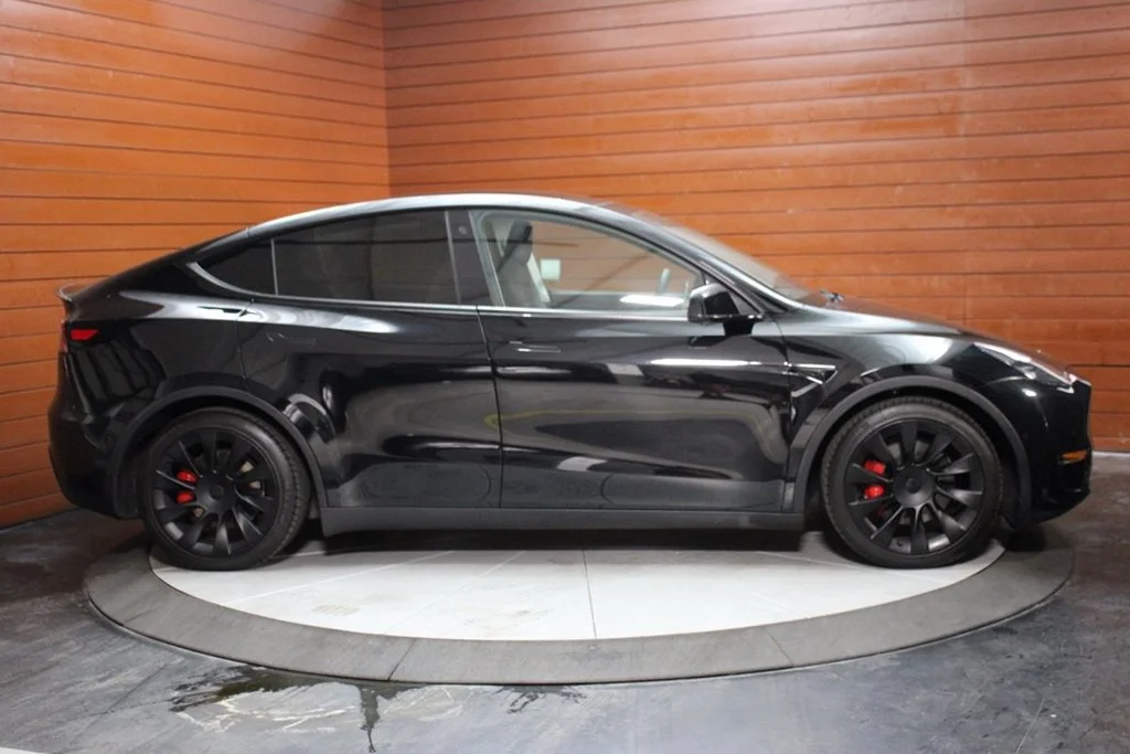 Used 2022 Solid Black Tesla Performance image 11