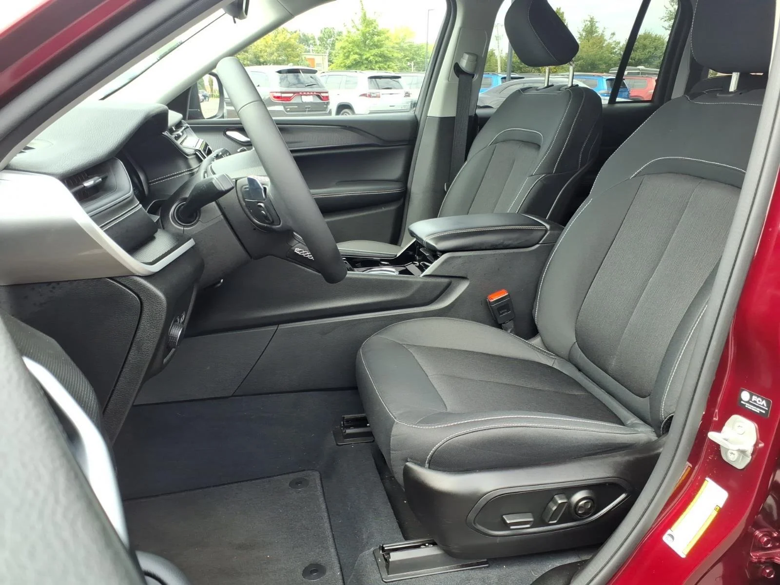 Used 2023 Velvet Red Pearlcoat Jeep Laredo image 18