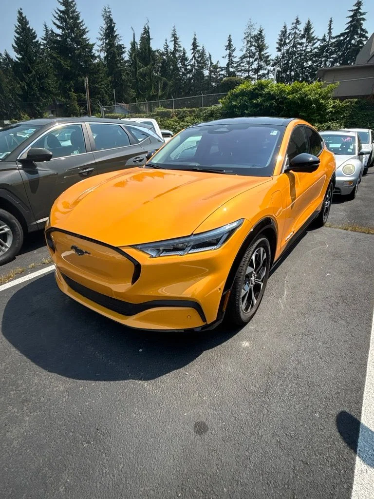 Used 2023 Orange Ford Premium image 1