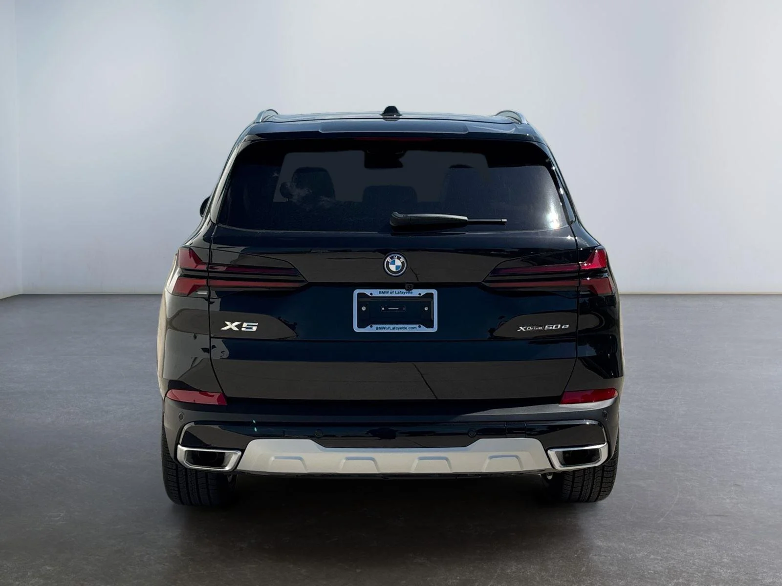 New 2026 Black Sapphire Metallic BMW xDrive50e image 4