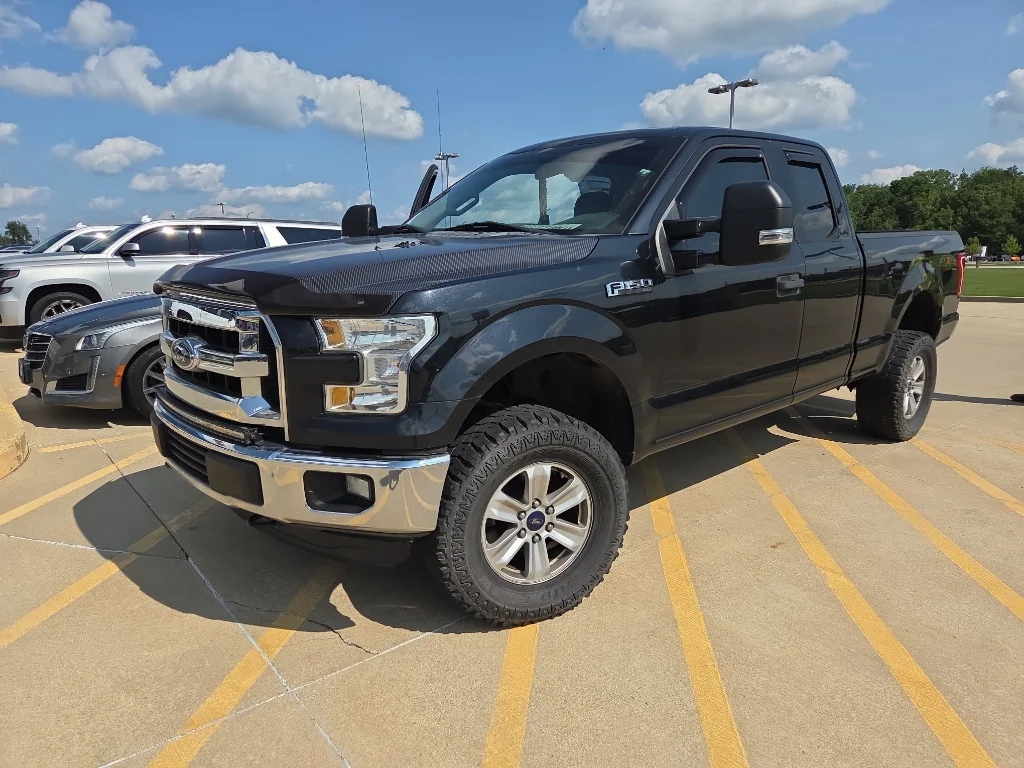 Used 2015 Tuxedo Black Metallic Ford XLT image 1