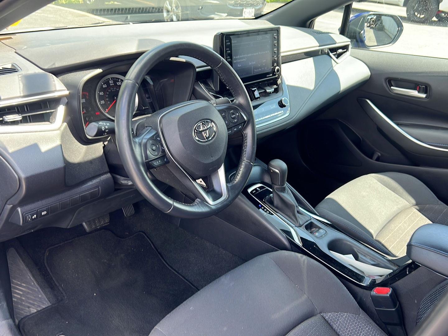 Used 2022 Blue Crush Metallic Toyota SE image 4