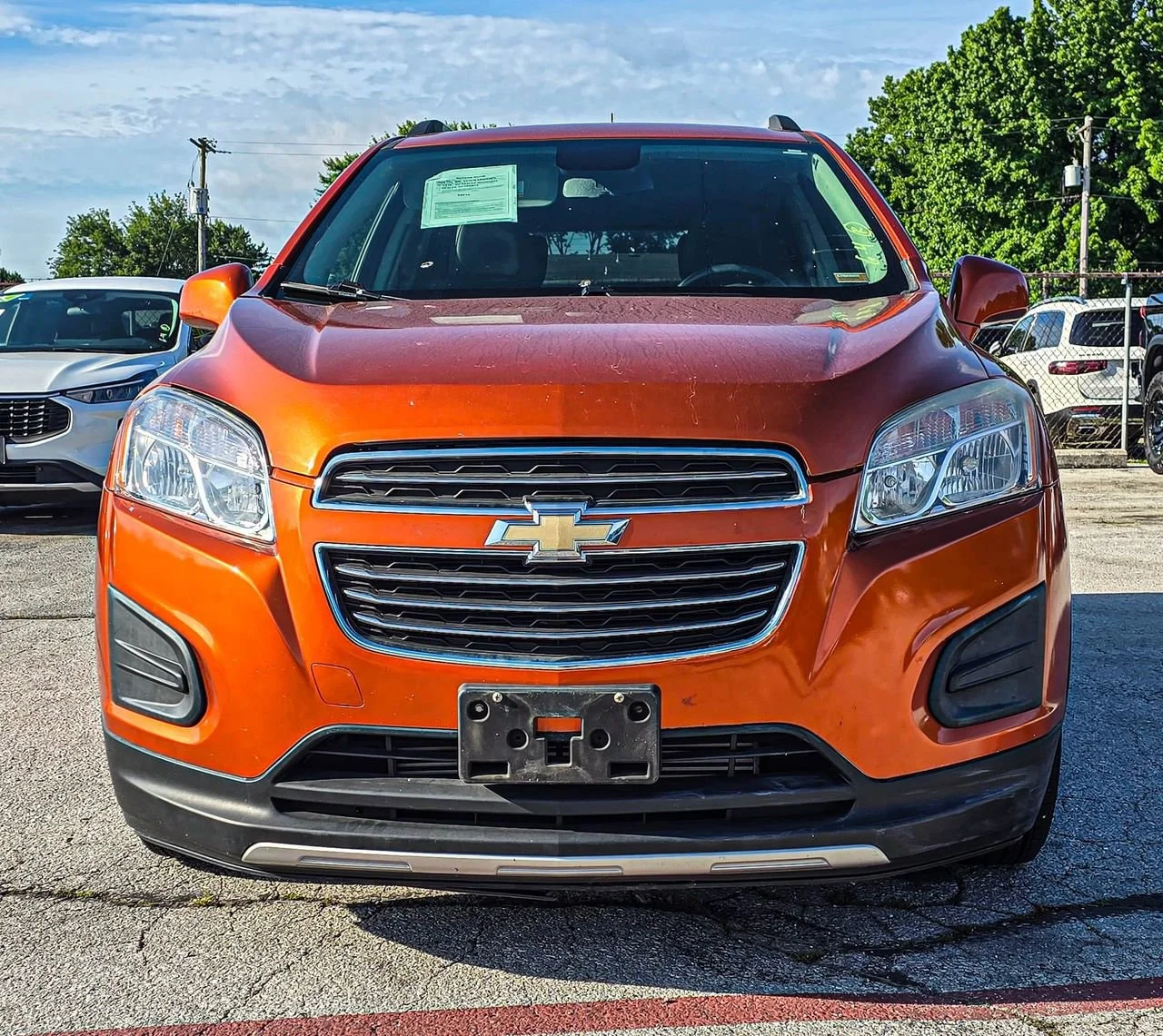 Used 2016 Orange Rock Metallic Chevrolet LT image 1