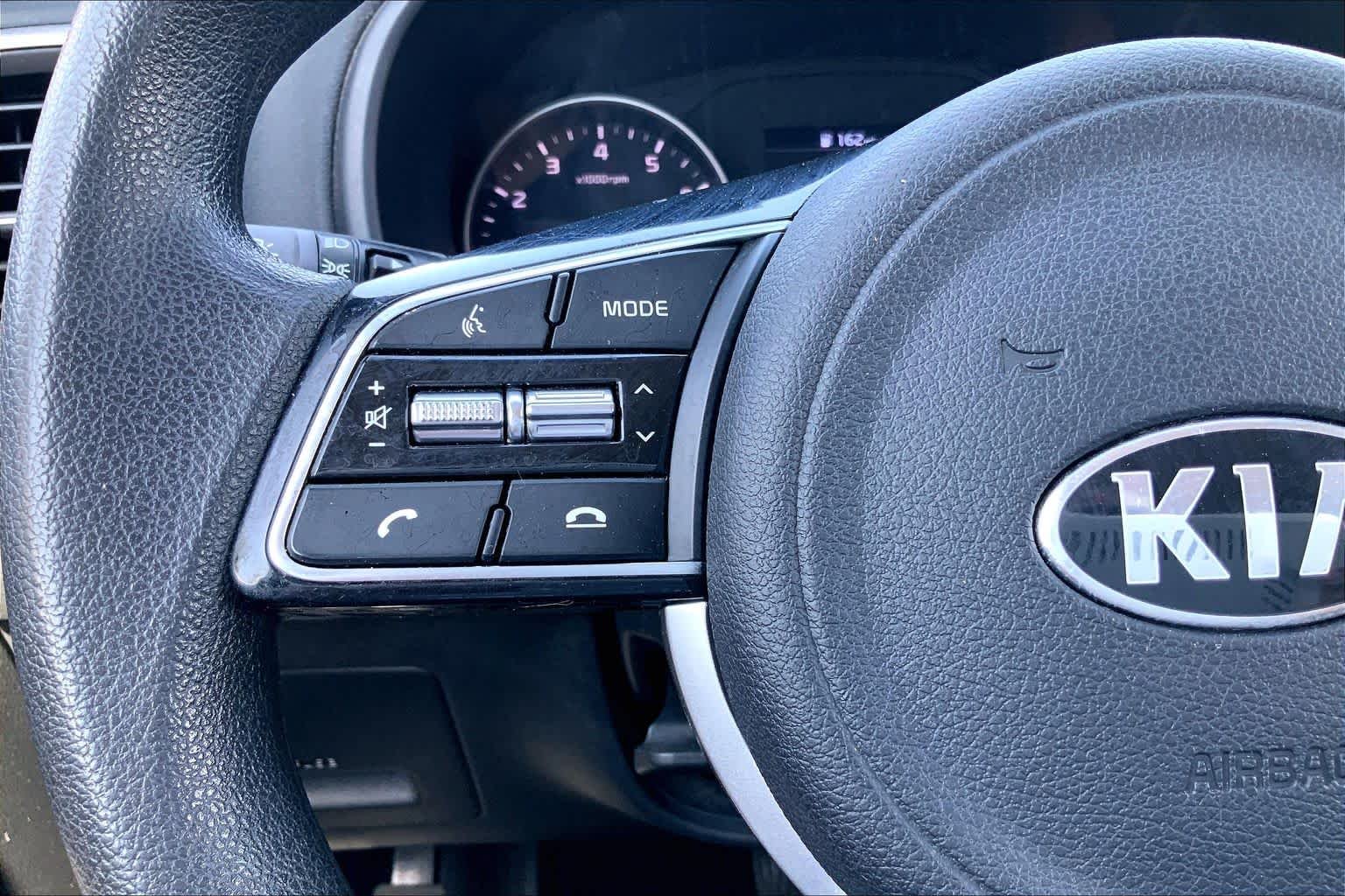 Used 2021 Snow White Pearl Kia LX image 24