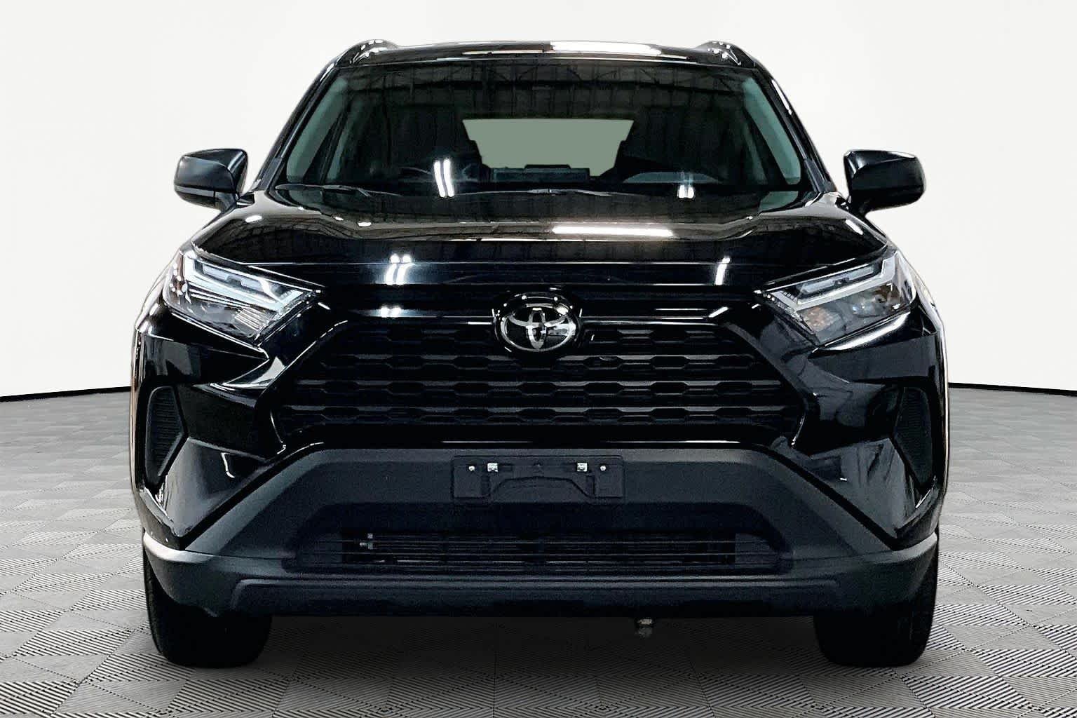 Used 2025 Midnight Black Metallic Toyota Hybrid LE image 4