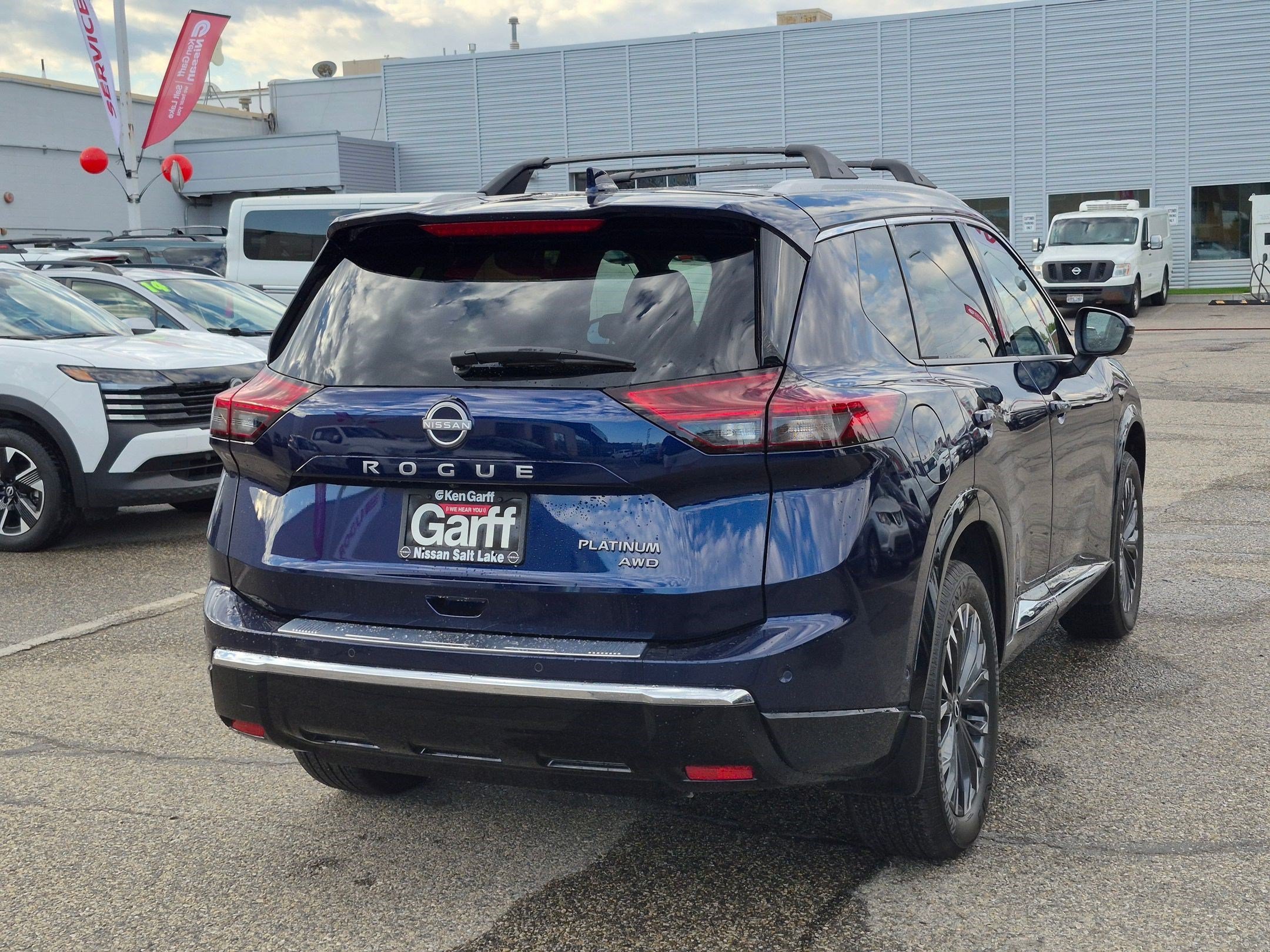 Used 2026 Deep Ocean Blue Pearl Nissan Platinum image 4