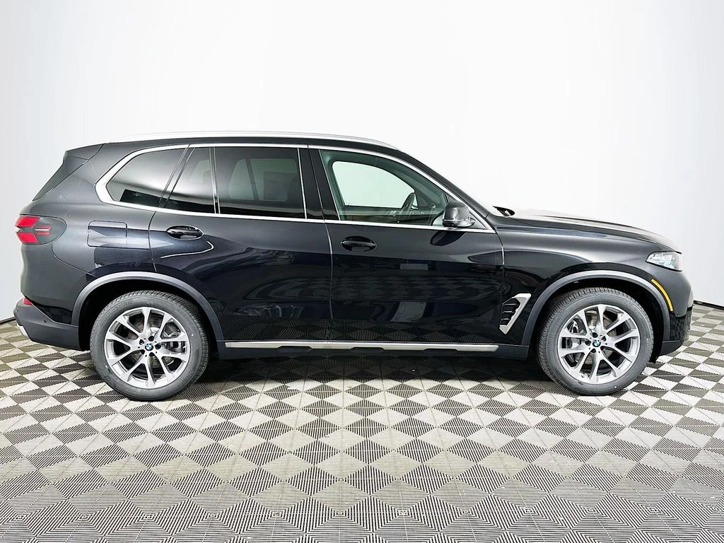New 2026 Black Sapphire Metallic BMW xDrive40i image 4