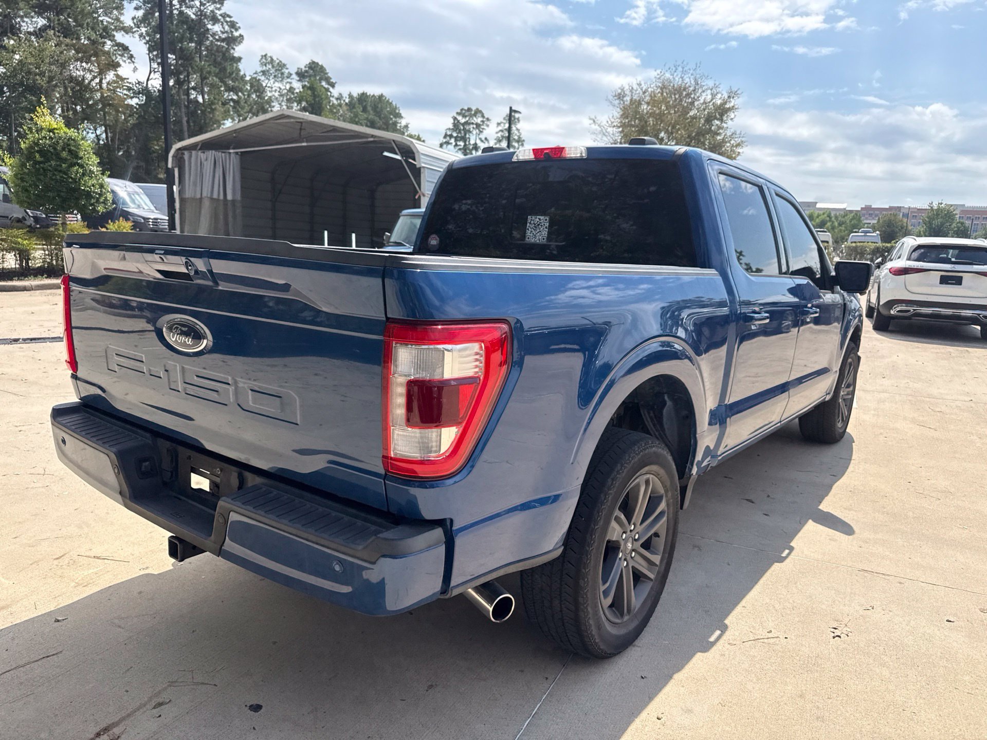 Used 2023 Atlas Blue Metallic Ford Lariat image 4
