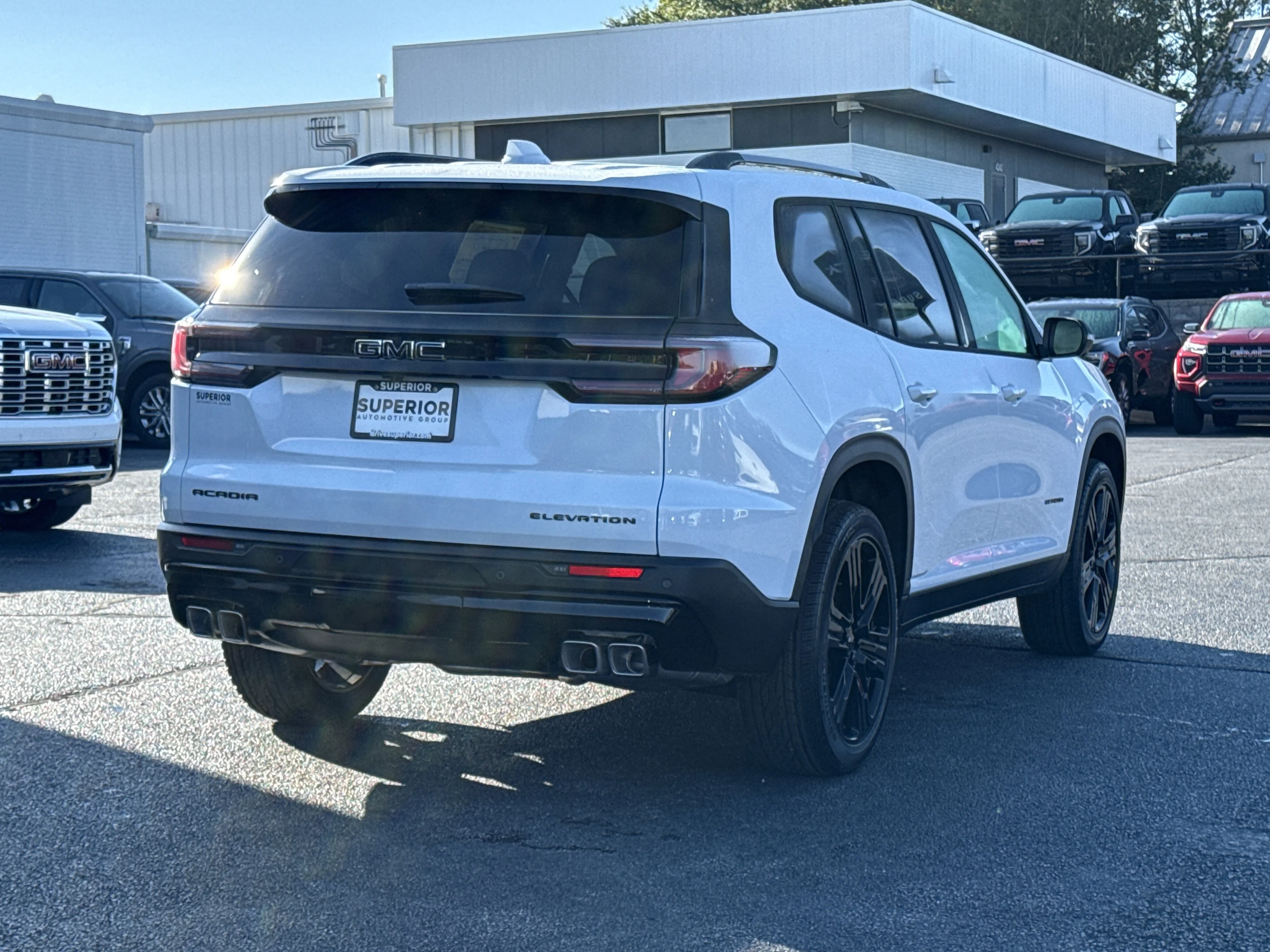 New 2026 Glacier White Tricoat GMC FWD Elevation image 2