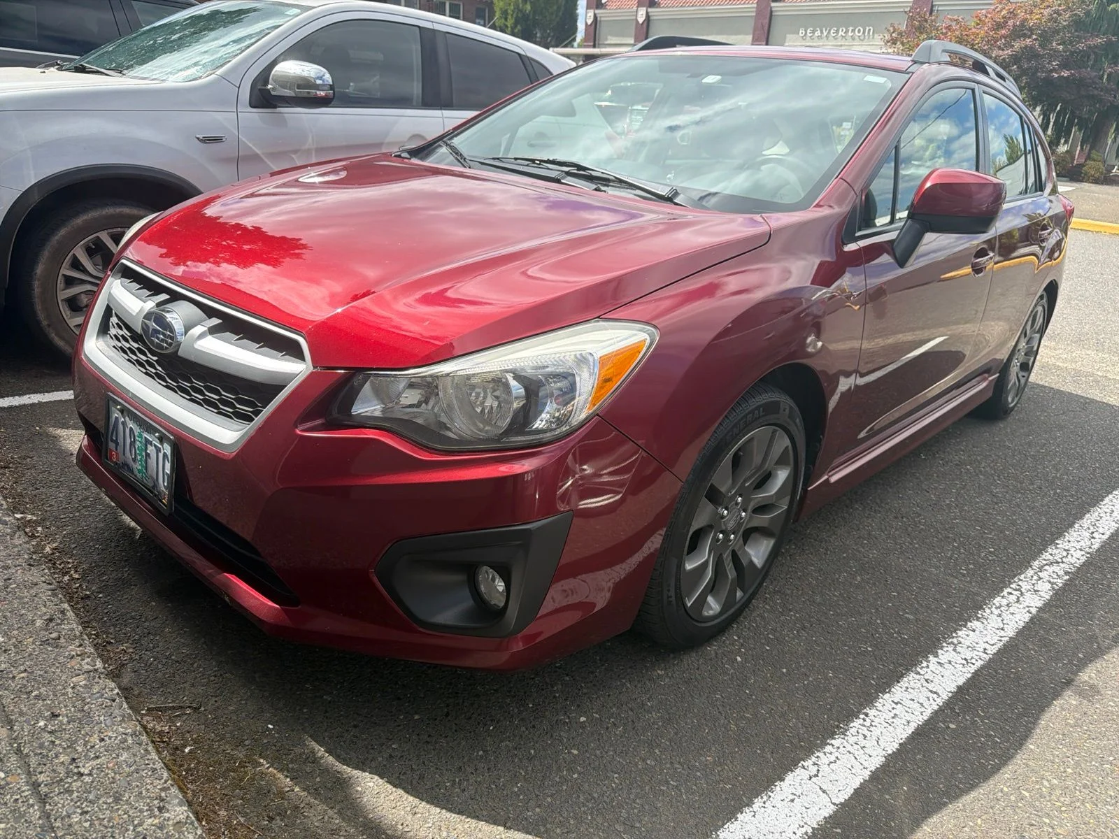 Used 2012 Lightning Red Subaru 2.0i Limited image 1