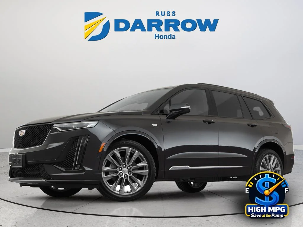 Used 2021 Black Cadillac Sport image 1