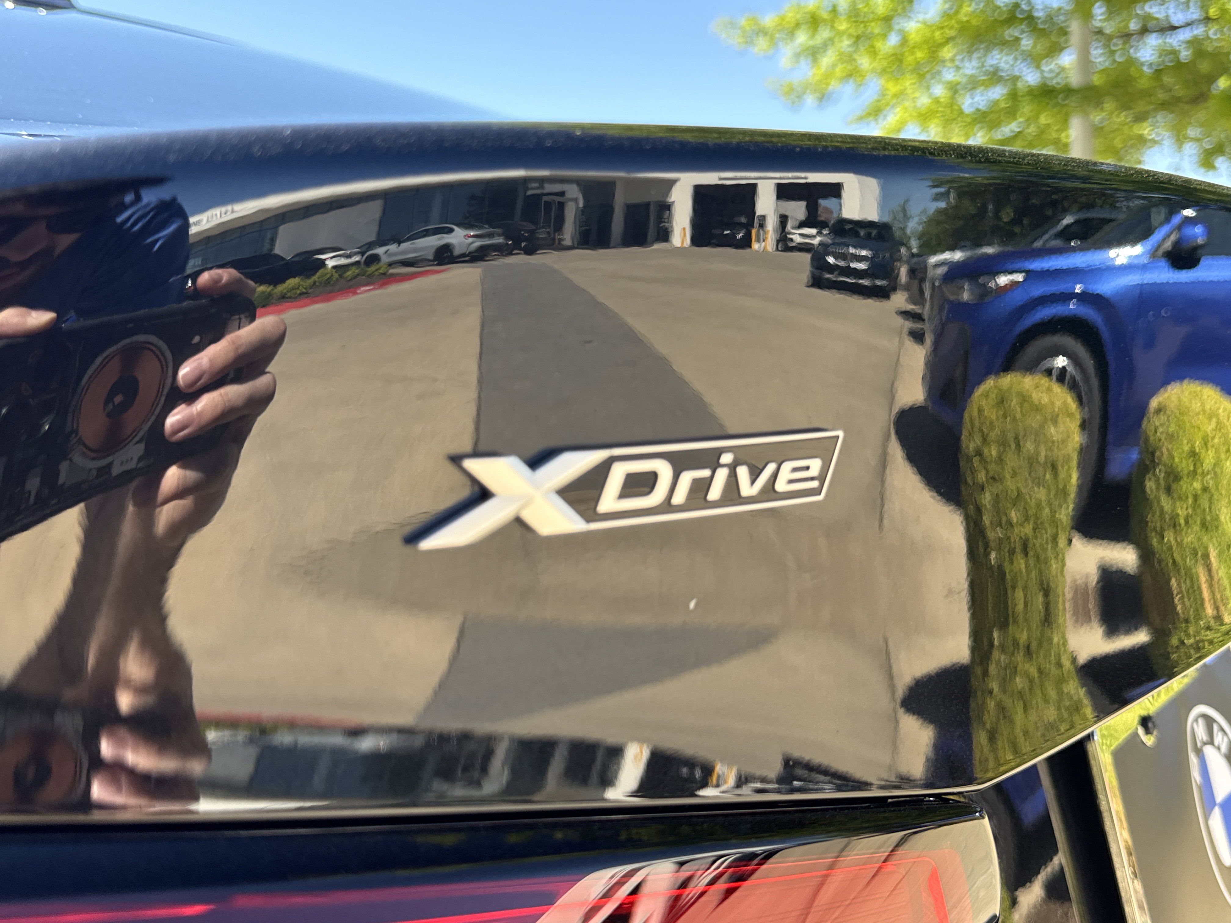 New 2026 0475 Black Sapphire Metallic BMW 228 xDrive image 8
