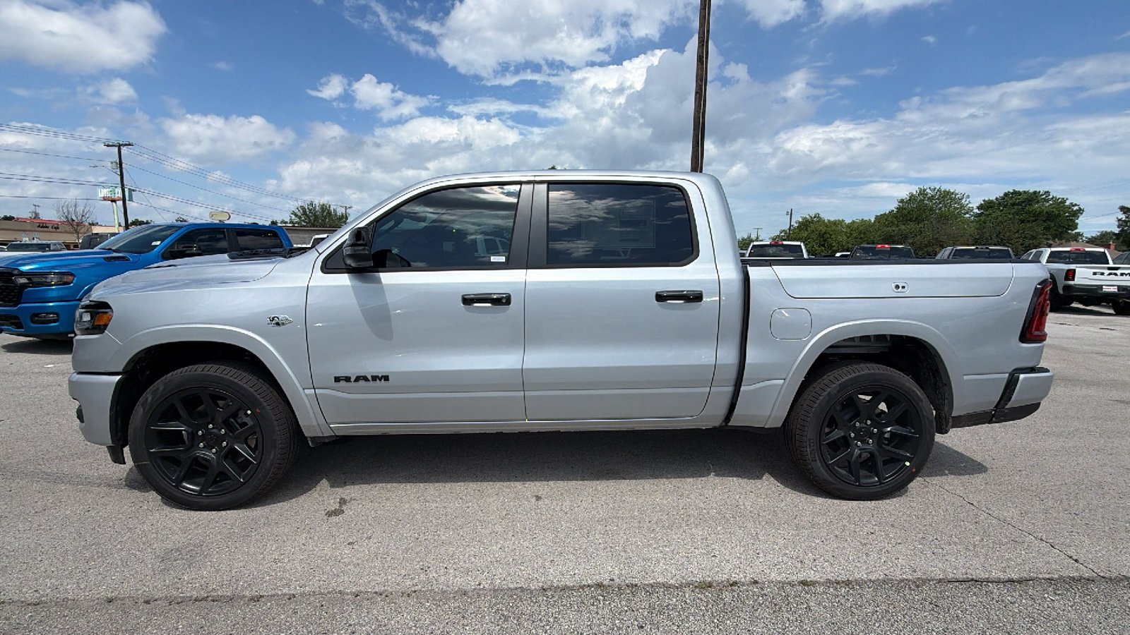 New 2026 Silver Zynith Exterior Paint RAM Laramie image 8
