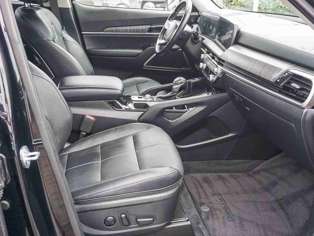 Used 2024 Ebony Black Kia EX image 13
