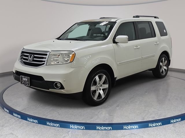 Used 2015 Diamond White Pearl Honda Touring image 1